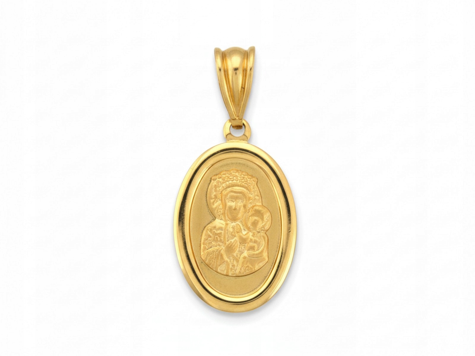 Oválný zlatý medailonek je ideální pro svaté přijímání