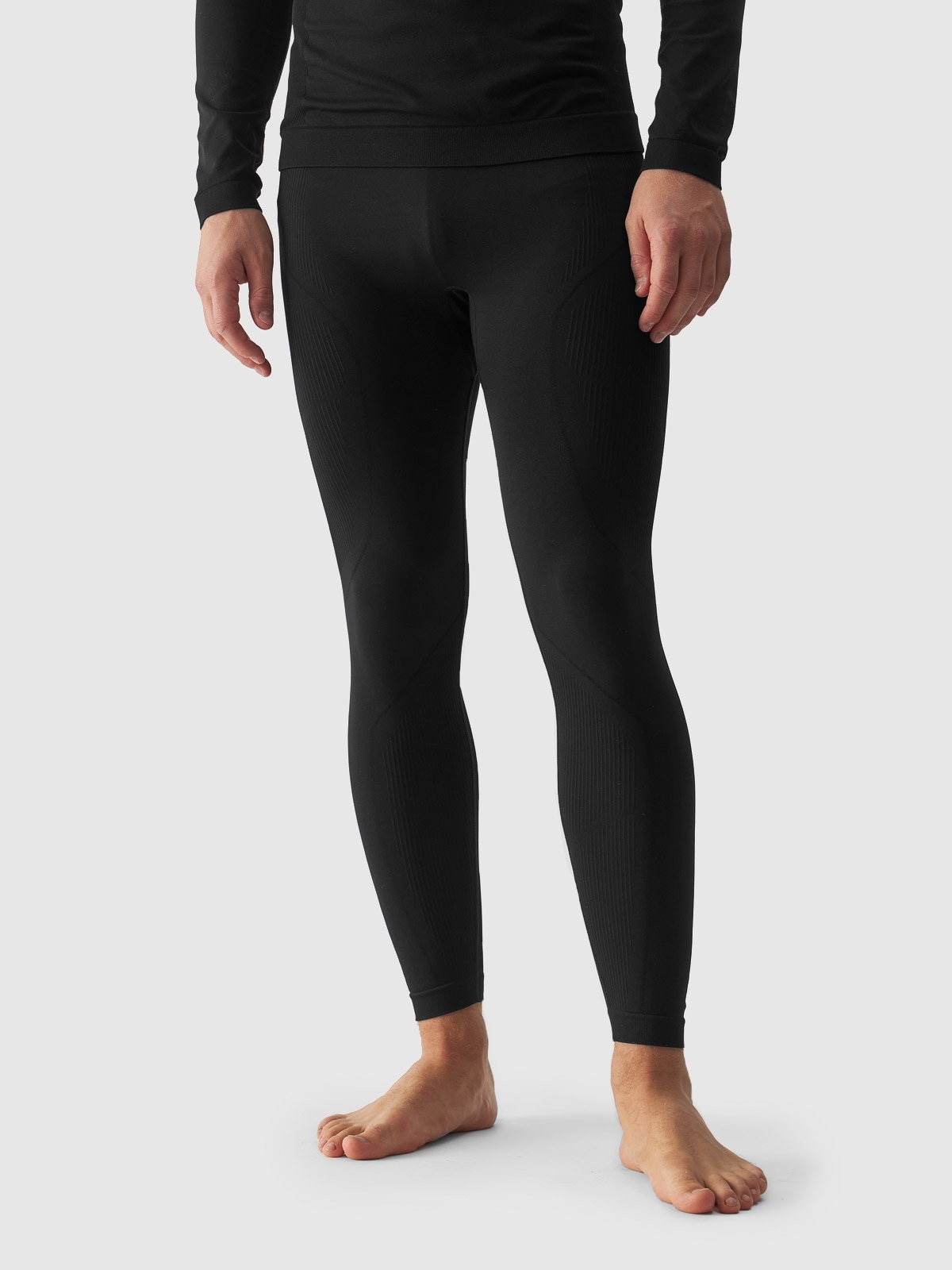 Pánské termoaktivní bezešvé legíny 4F M173 černé L/XL