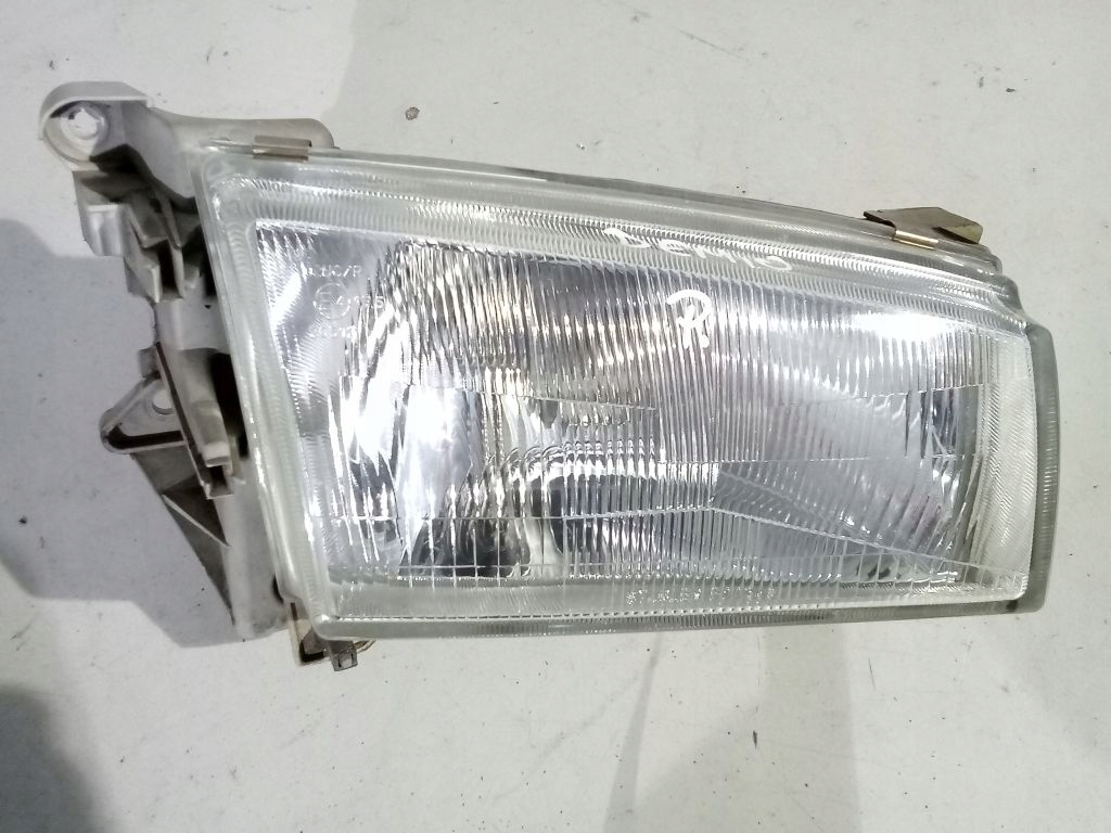 Mazda Demio and light right front front