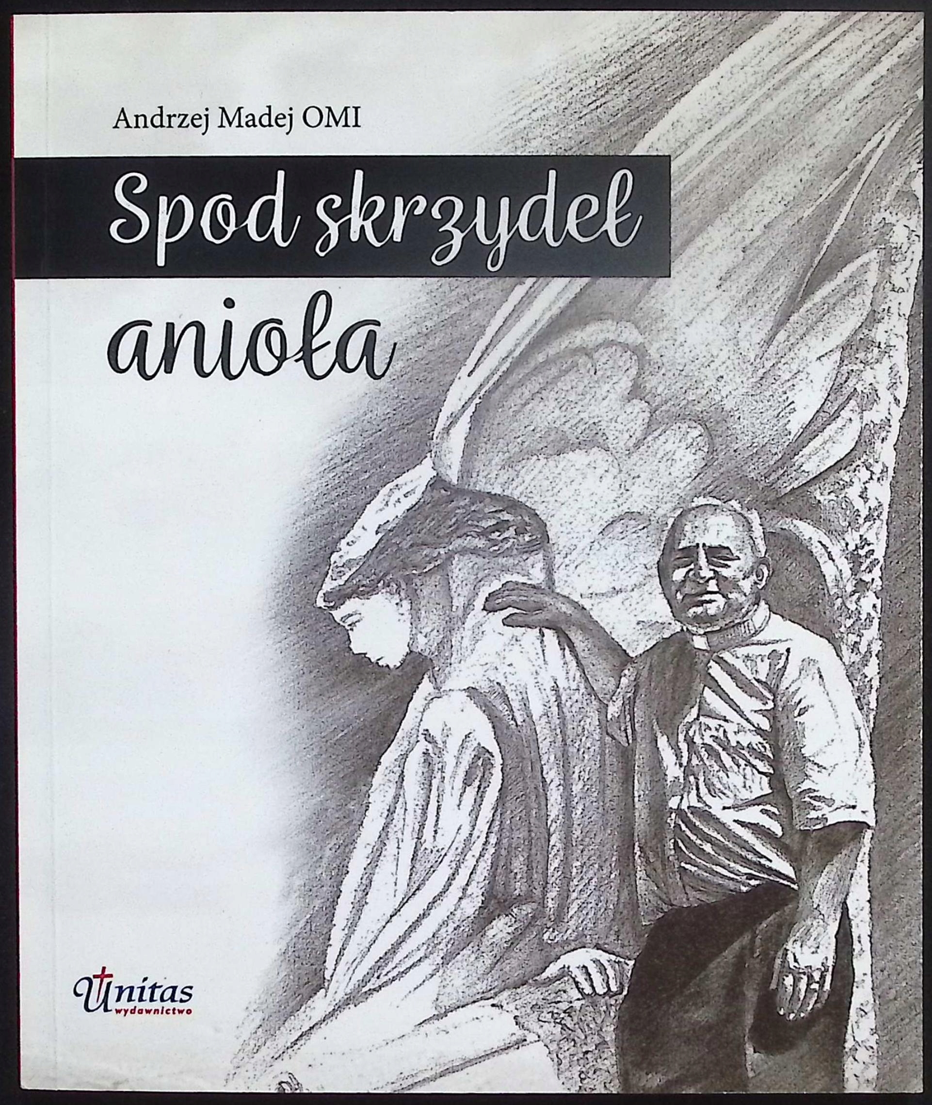 Spod skrzydeł anioła Madej