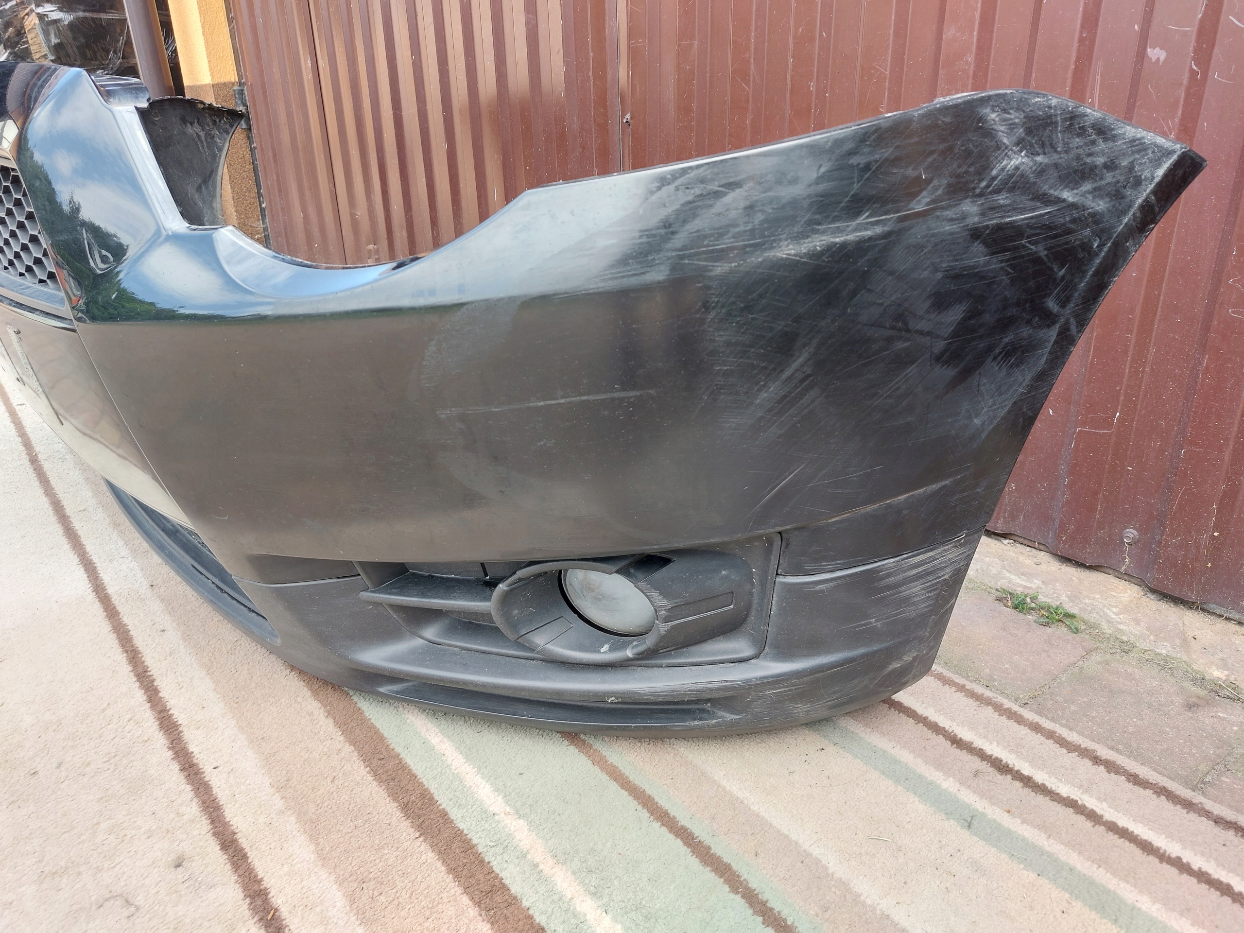 bumper front MITSUBISHI COLT 6 VI LIFT 08-12 6400C105 black