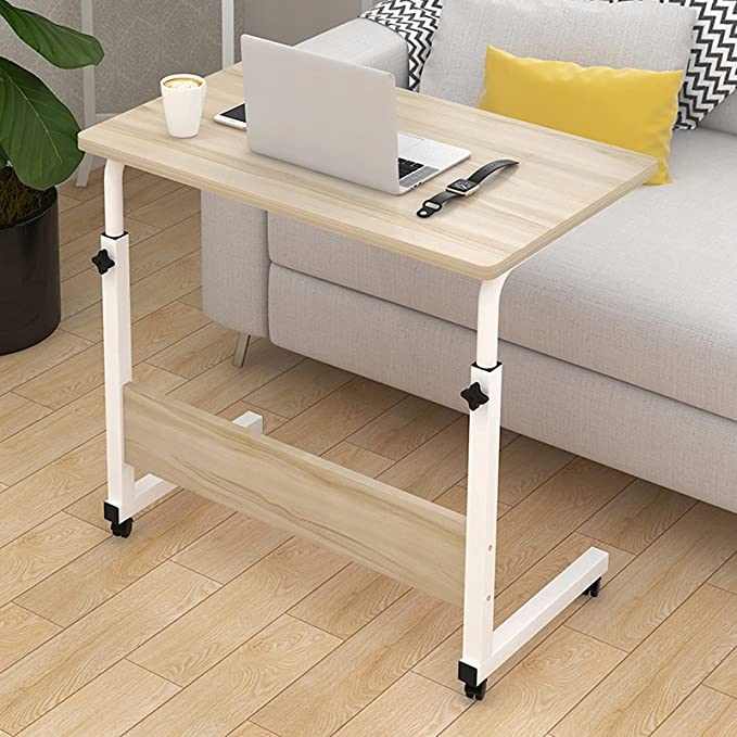 Mobilne regulowane biurko stolik na kółkach wysoki pod laptop tablet kawę Marka Ecarla