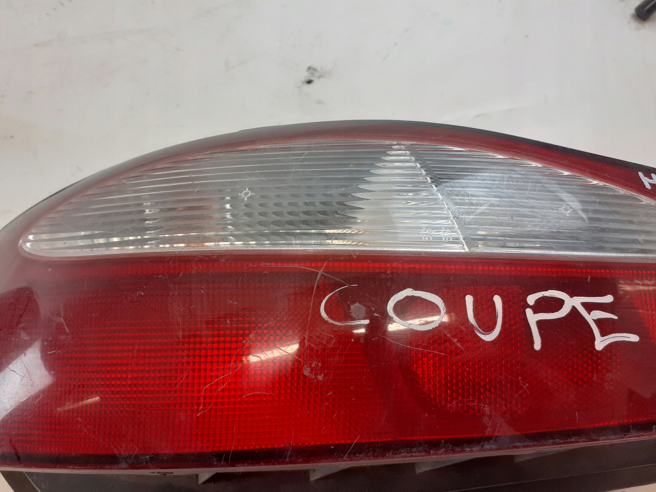Hyundai Coupe and light rear part right