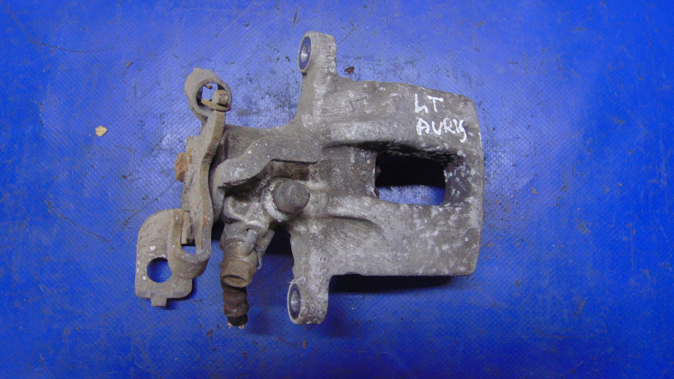 caliper left rear part TOYOTA AURIS II 13-18 ROK