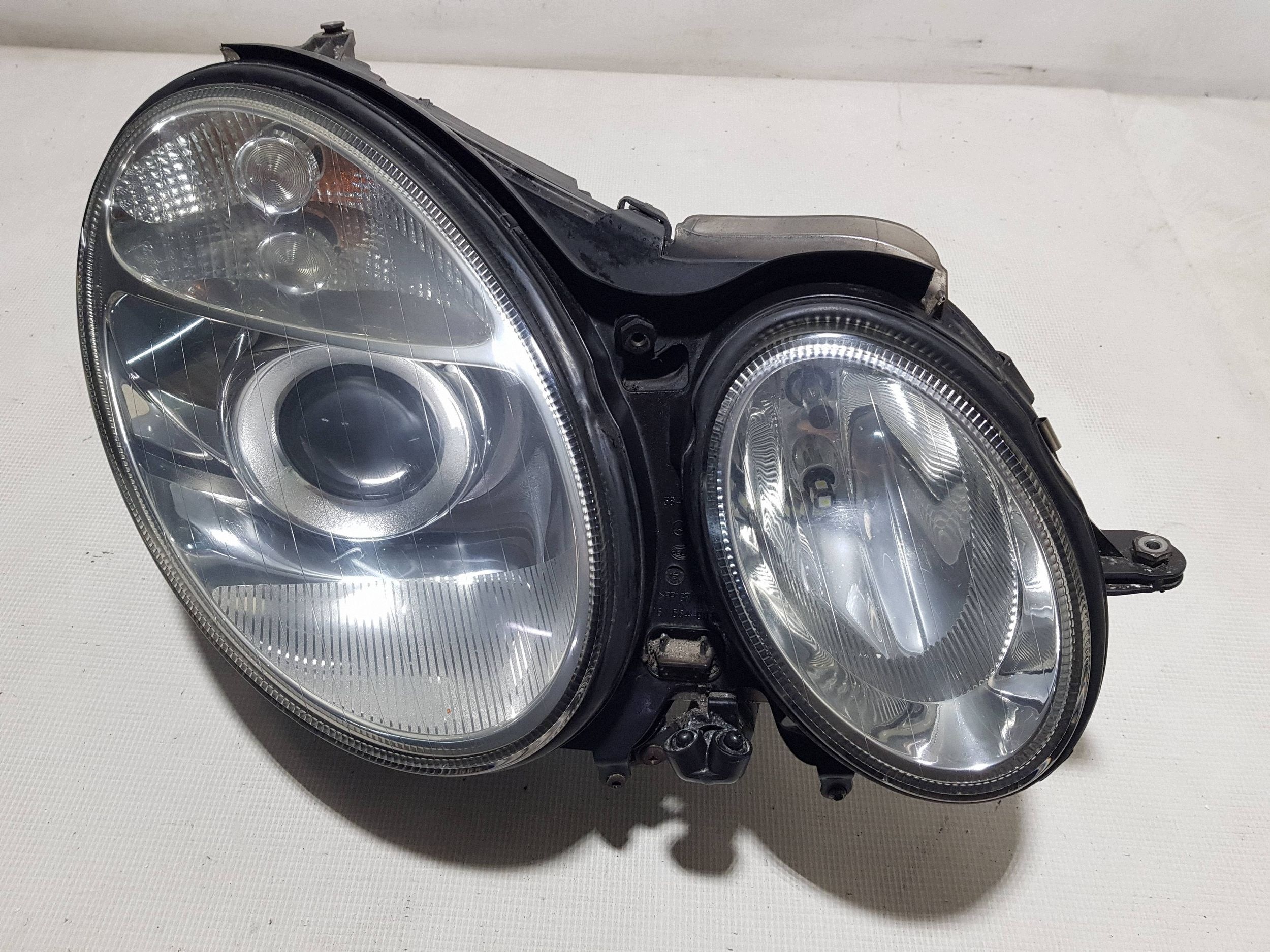 light XENON front right Mercedes E W211 right hand drive