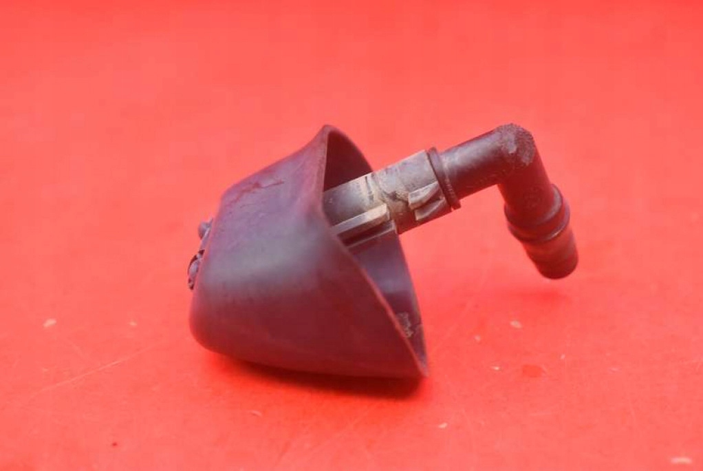 washer REFLEKTOROW left 90559588 OPEL ASTRA 2 II G 98-09