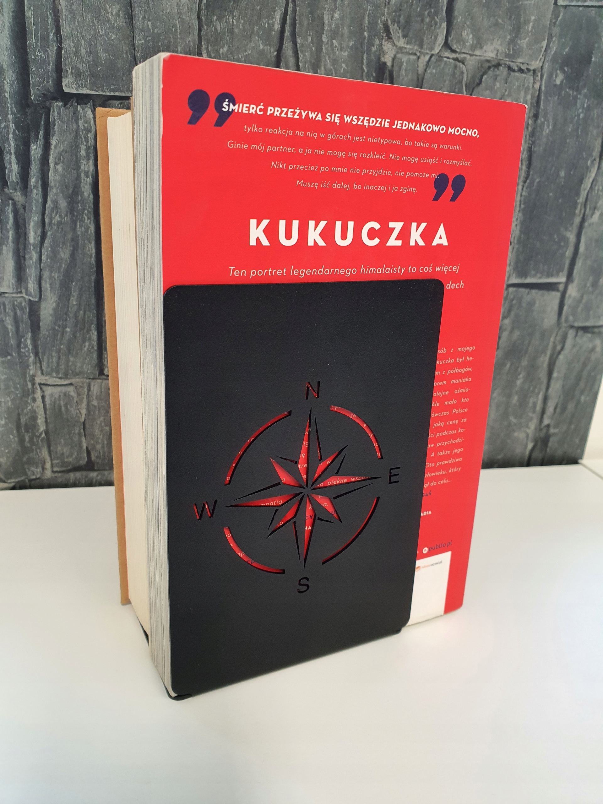 PODPÓRKA do książek RÓŻA WIATRÓW 110x160 Materiał metal