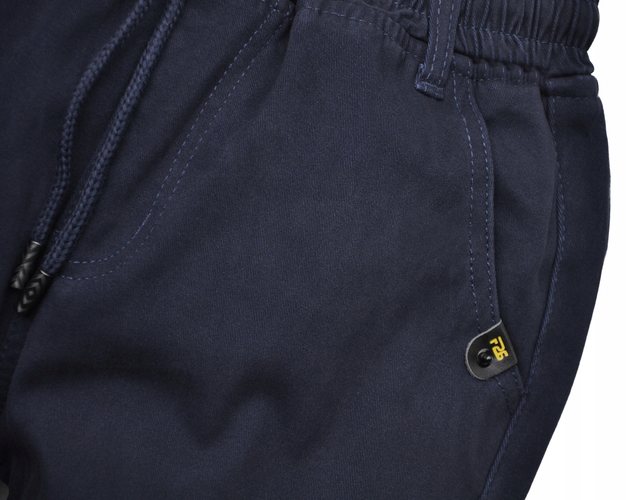 SCOT Spodnie joggery GRANAT ocieplane polarem (140 158 164 170) r 146/152 Kolor niebieski