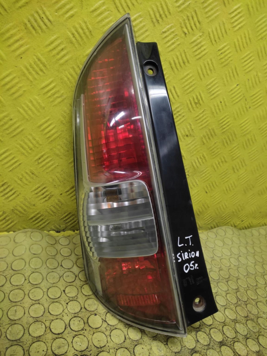 DAIHATSU SIRION II light left rear part 22051763