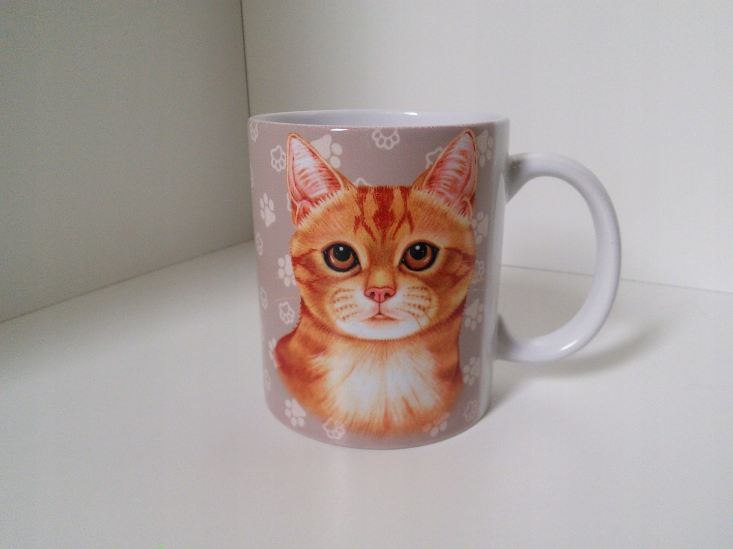 

Kubek ceramiczny z motywem i napisem- Kot Rudy