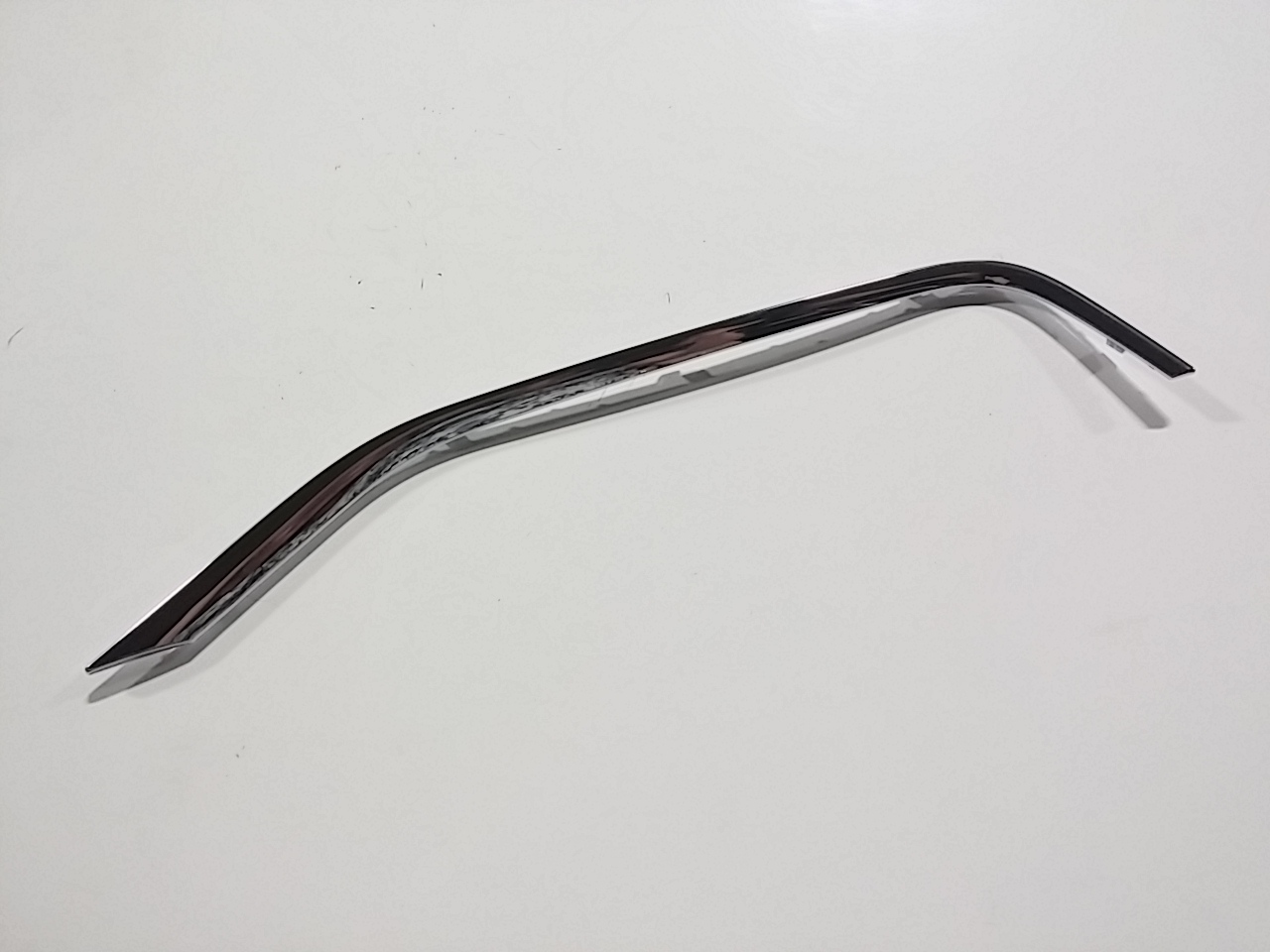 Volvo S60 pravá lišta chrom nárazník 31323855 Oe