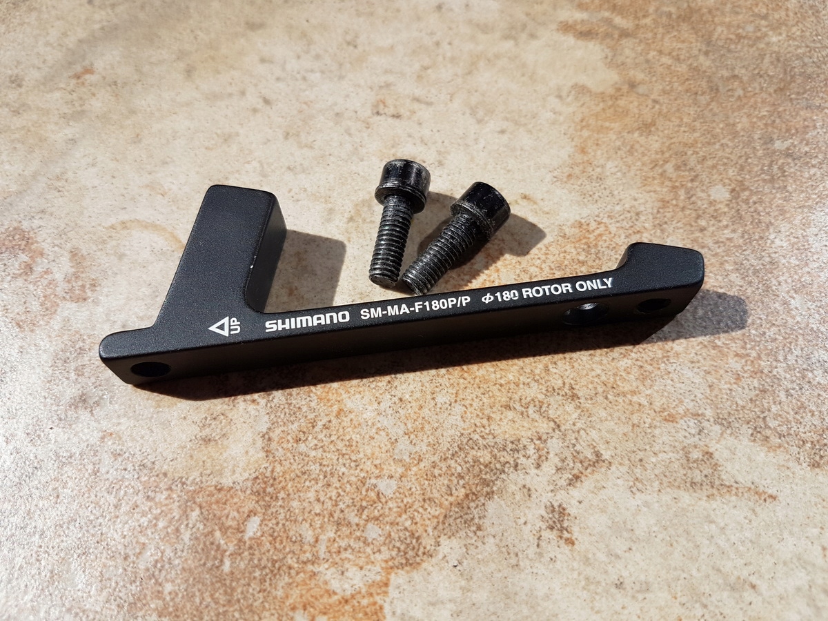 ADAPTER hamulca tarczowego Shimano SM-MA-F180P/P