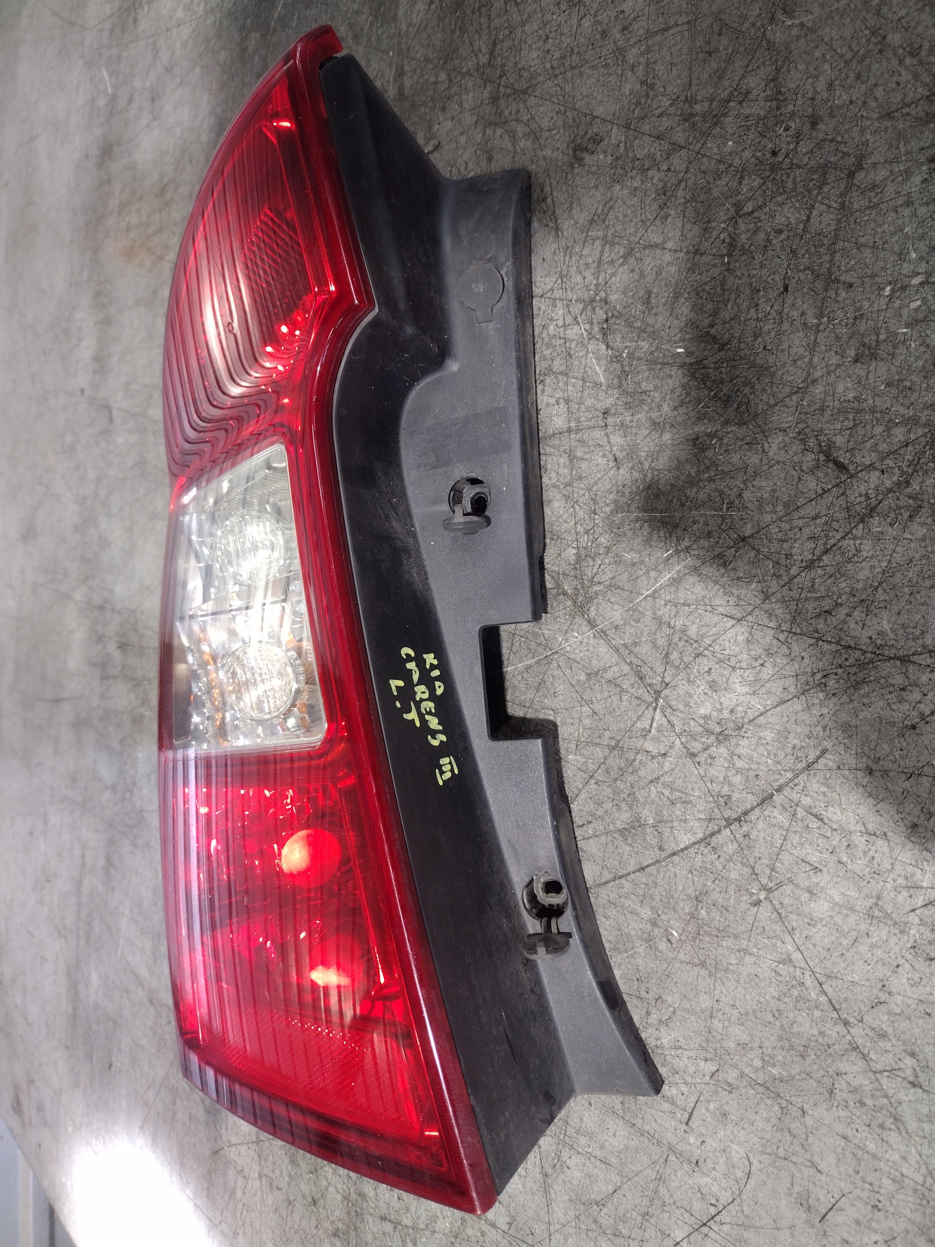 фонарь левый kia CARENS III