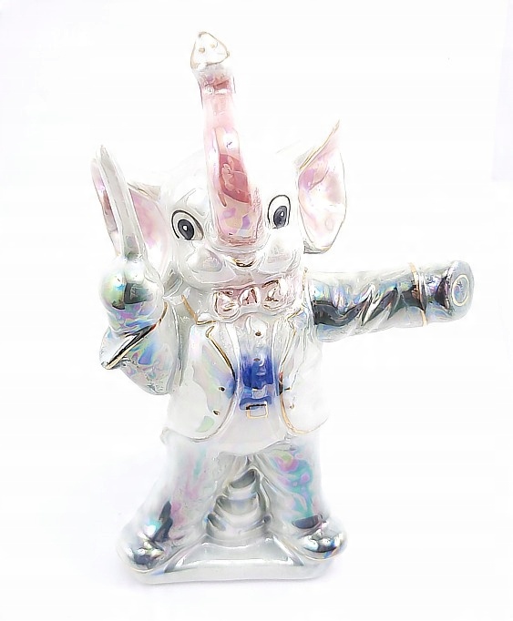 

Porcelanowa Figurka/ Słoń Dyrygent/szczęście