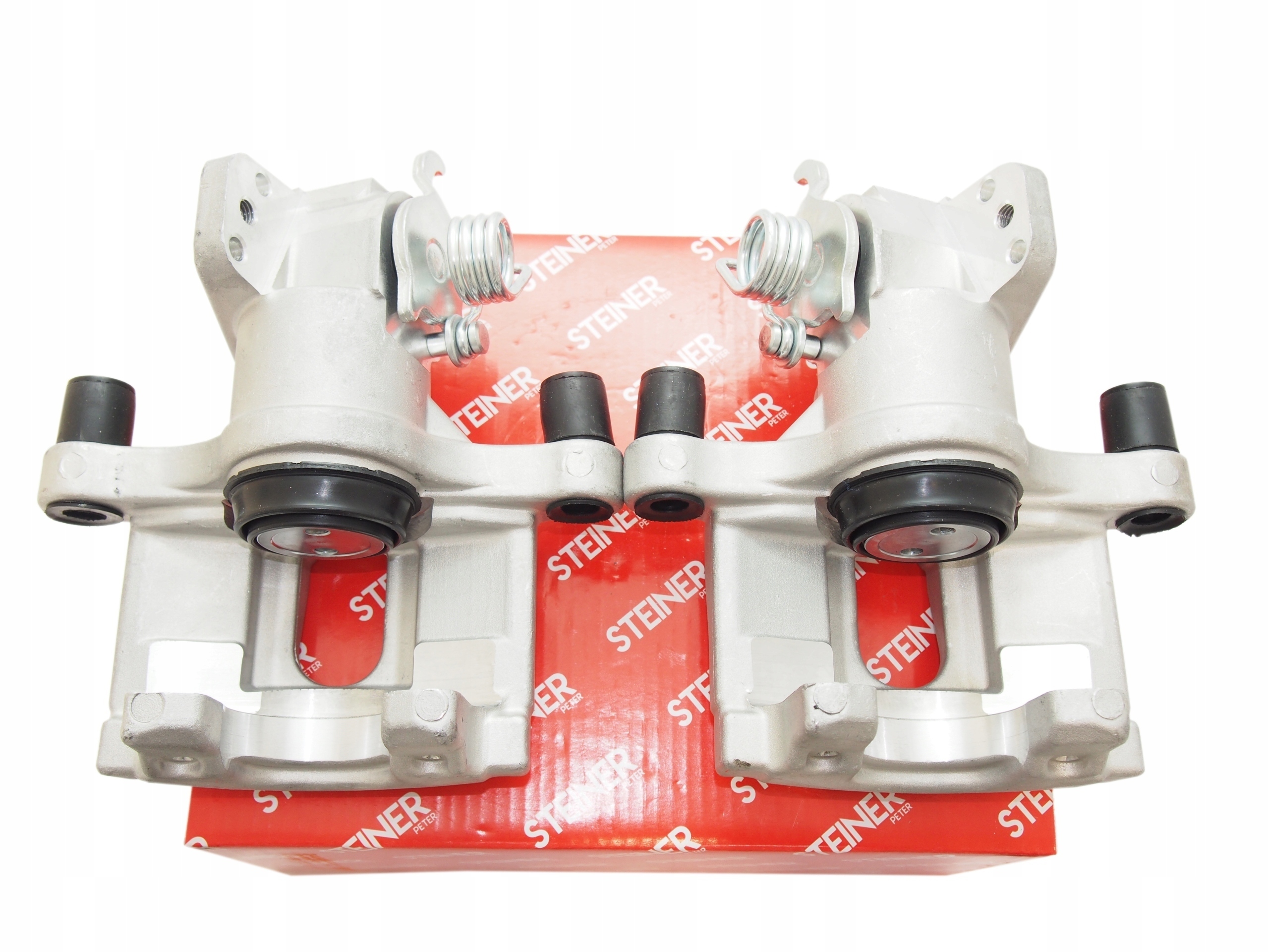 ST.2.NS.002 ST.2.NS.003 - ЗАЖИМ HAM. ЗАДНИЙ ЛЕВЫЙ + ПРАВЫЙ NISSAN PRIMERA WP12 02-