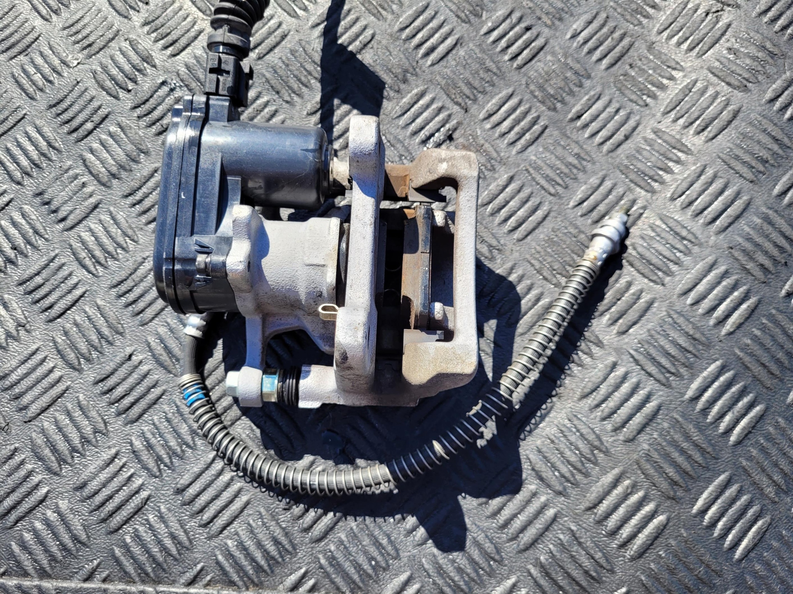 caliper rear part rear electrical left SSANGYONG KGM TORRES EVX