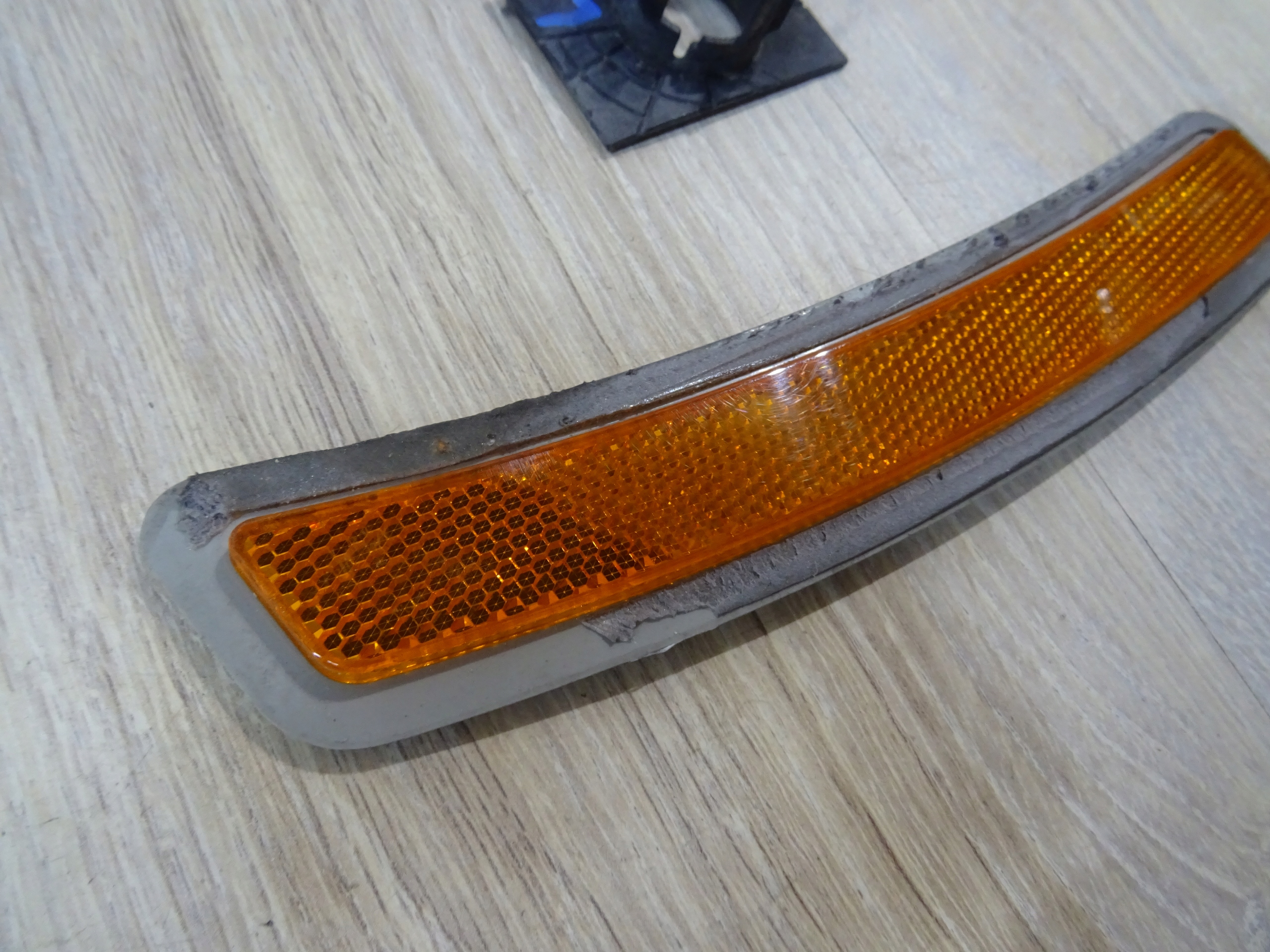 Odblask obrysówka prawa BMW G20 USA 7433786 Producent części BMW OE