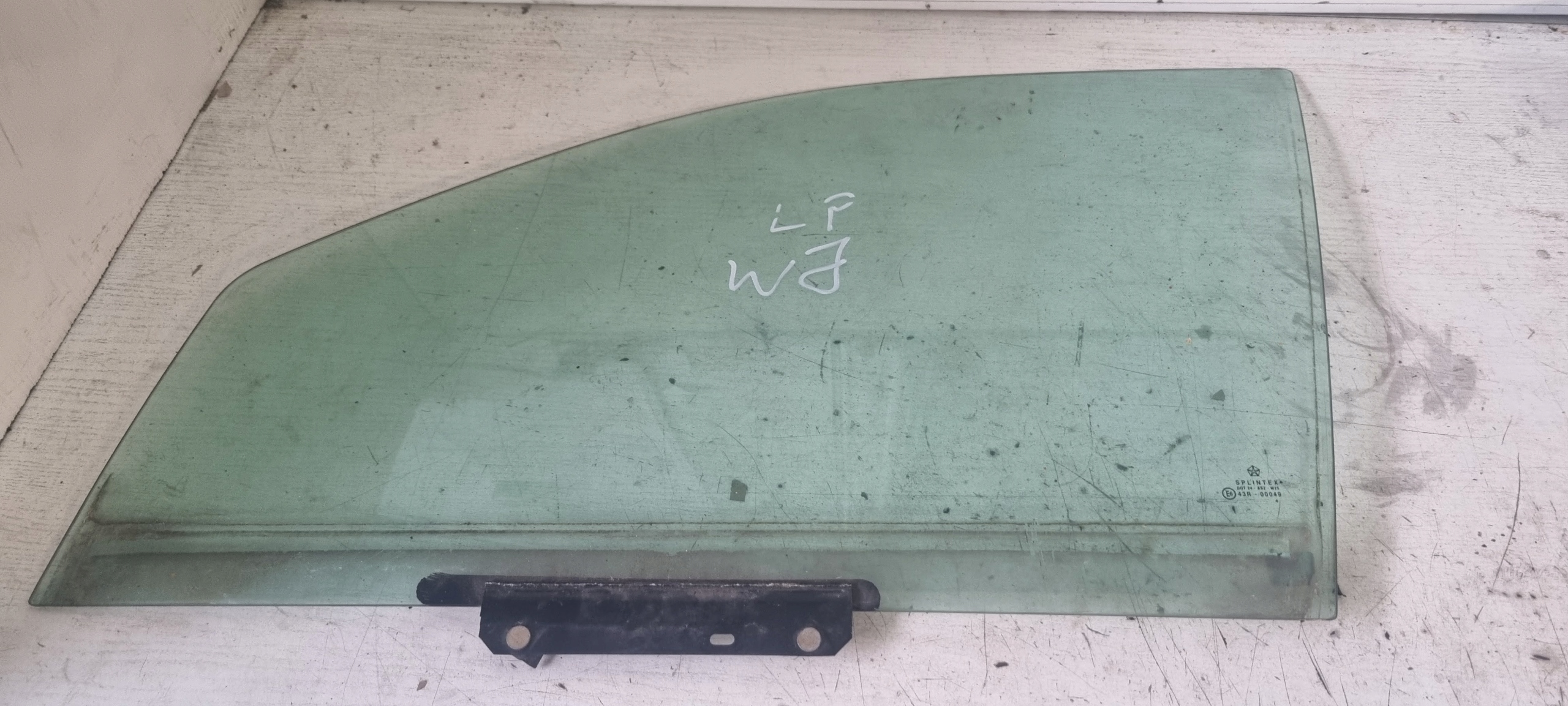 Szyba drzwi przednich Jeep Grand Cherokee Wj