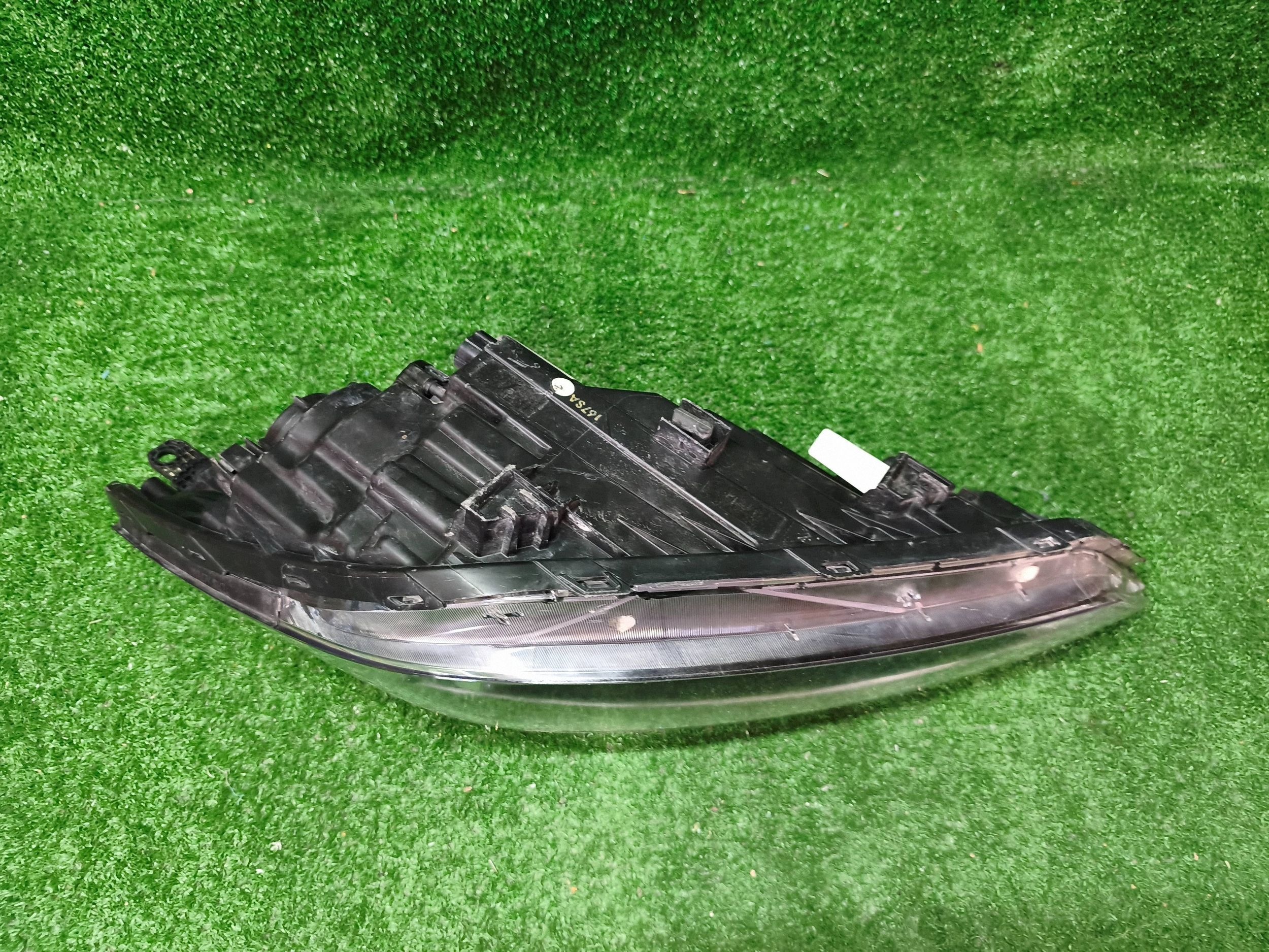 REFLEKTOR left front HYUNDAI TUCSON III 15- lens NR.1552