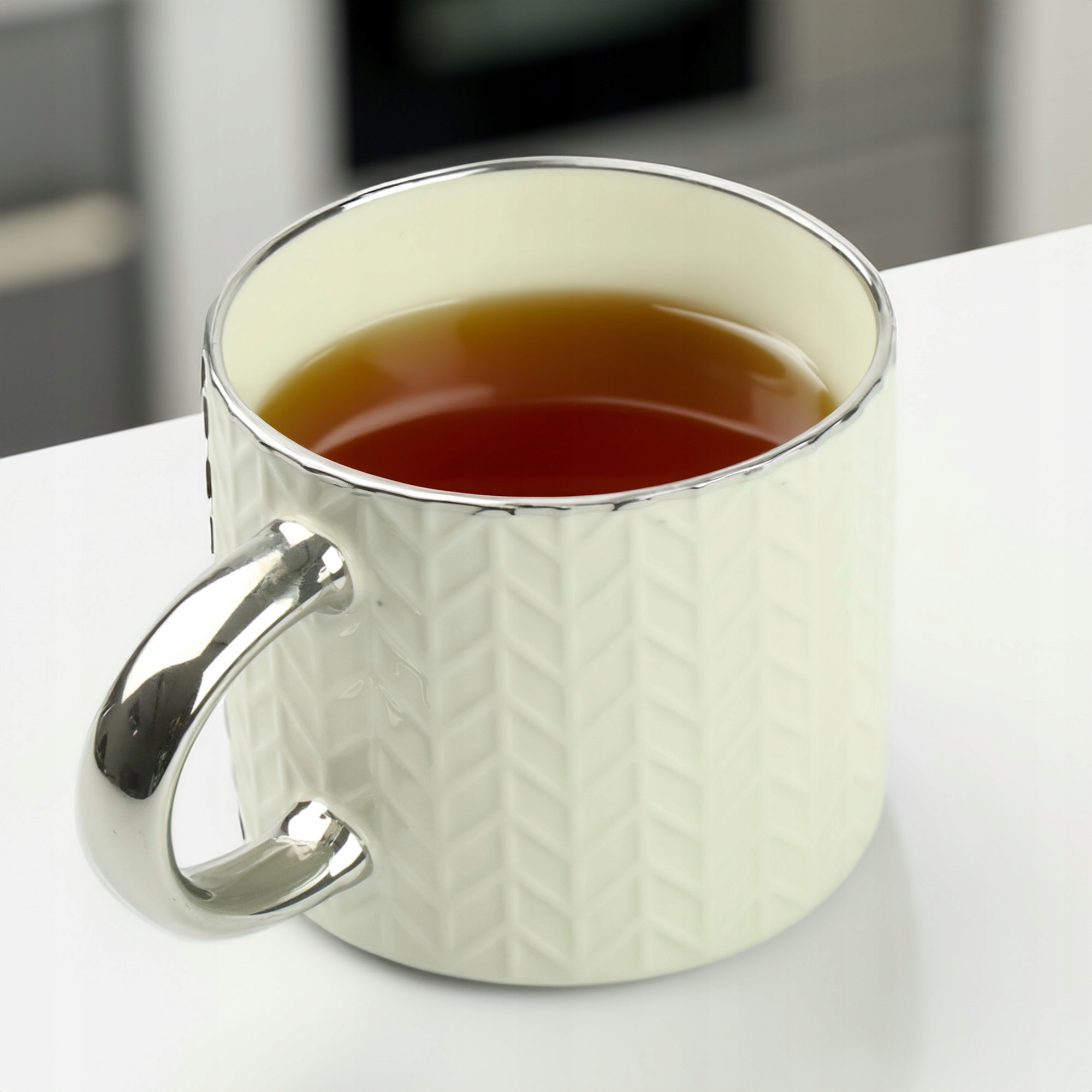 KUBEK PORCELANOWY DO KAWY HERBATY WZÓR SWETEREK 470ML ZE SREBRNYM UCHEM