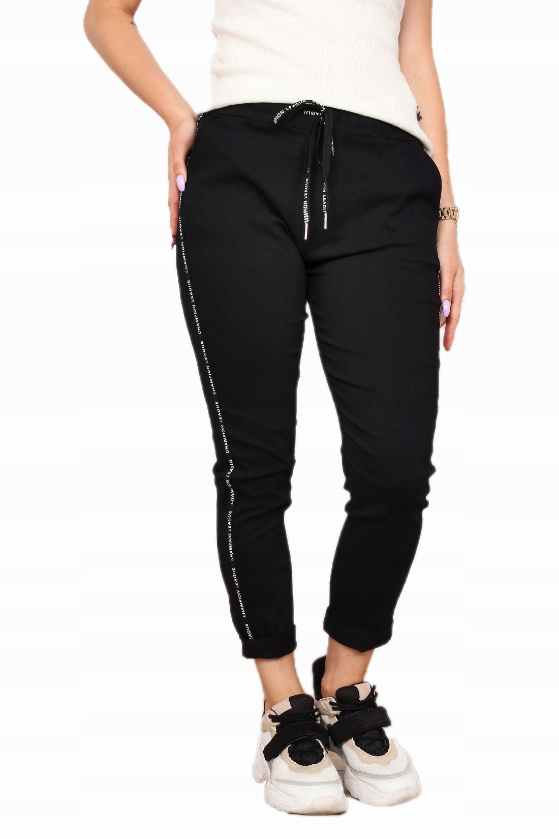 

Spodnie 7/8 Wysoki Stan Lampas Kolory 40 L 2063