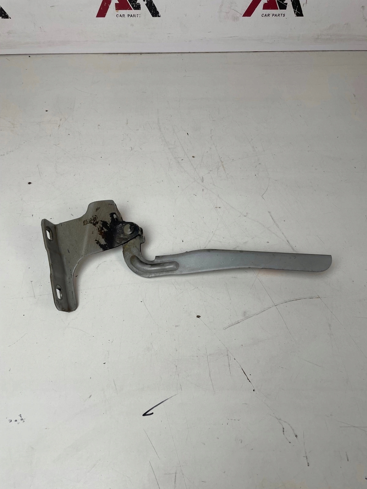 hinge bonnets front front right Nissan Tiida and sedan