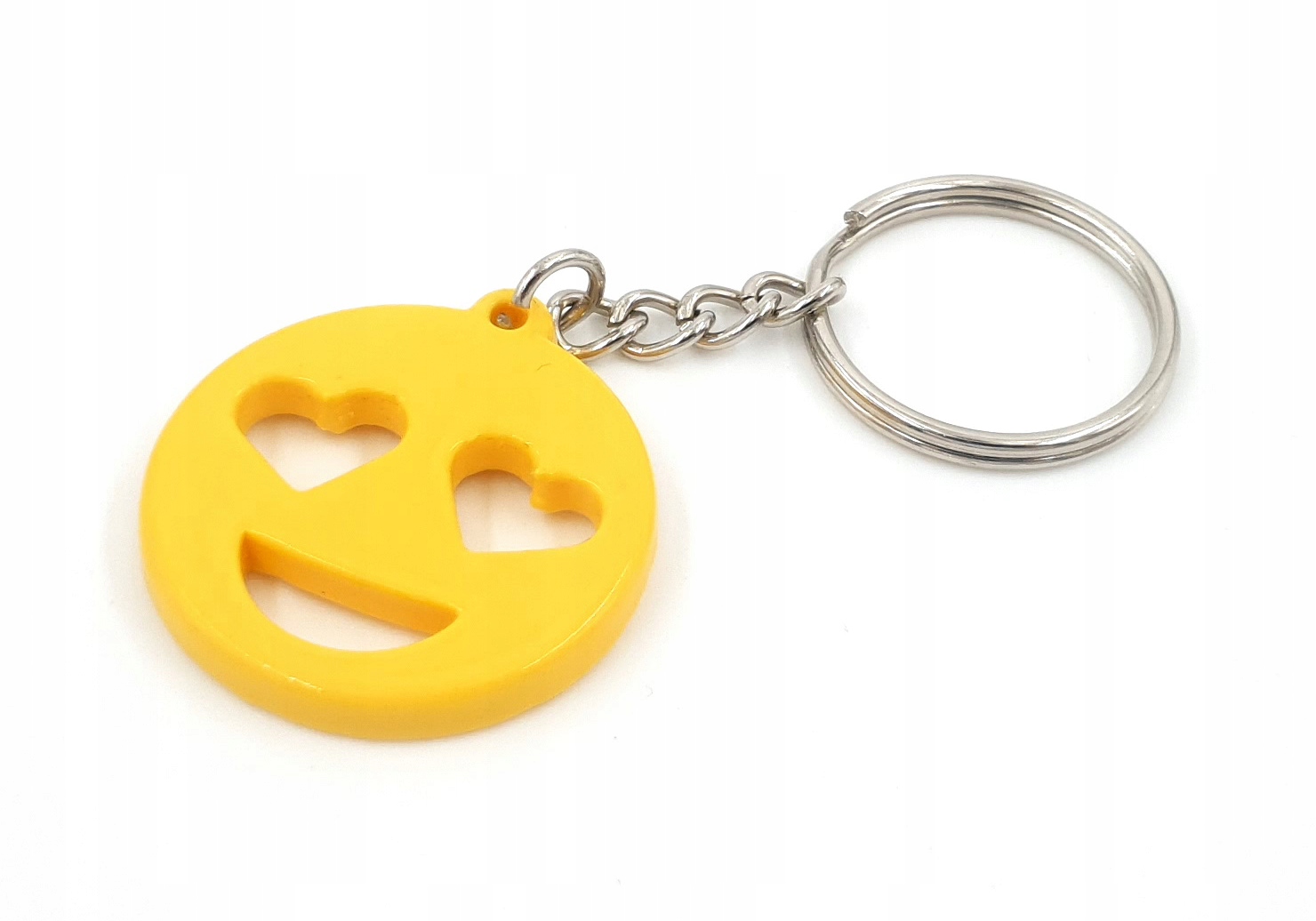 

Brelok Emoji. Uśmiech z sercem żółty.