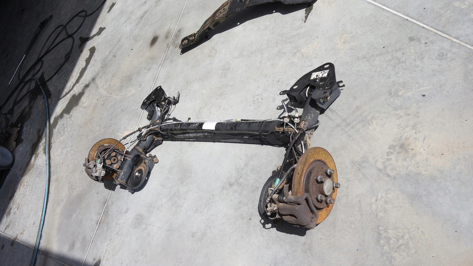 ZAWIESZENIE TYLNE TYŁ RENAULT KANGOO II 1.6 Producent części Renault OE