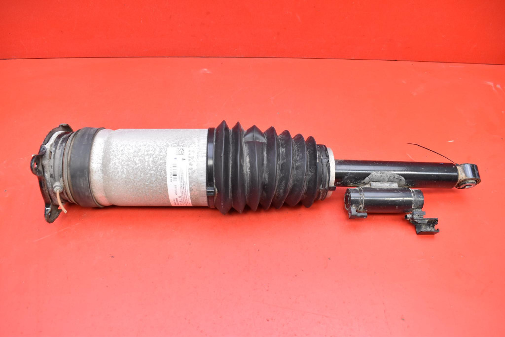 shock absorber left rear part 1066461-00-C TESLA MODEL S PERFORMANCE LIFT 16-21