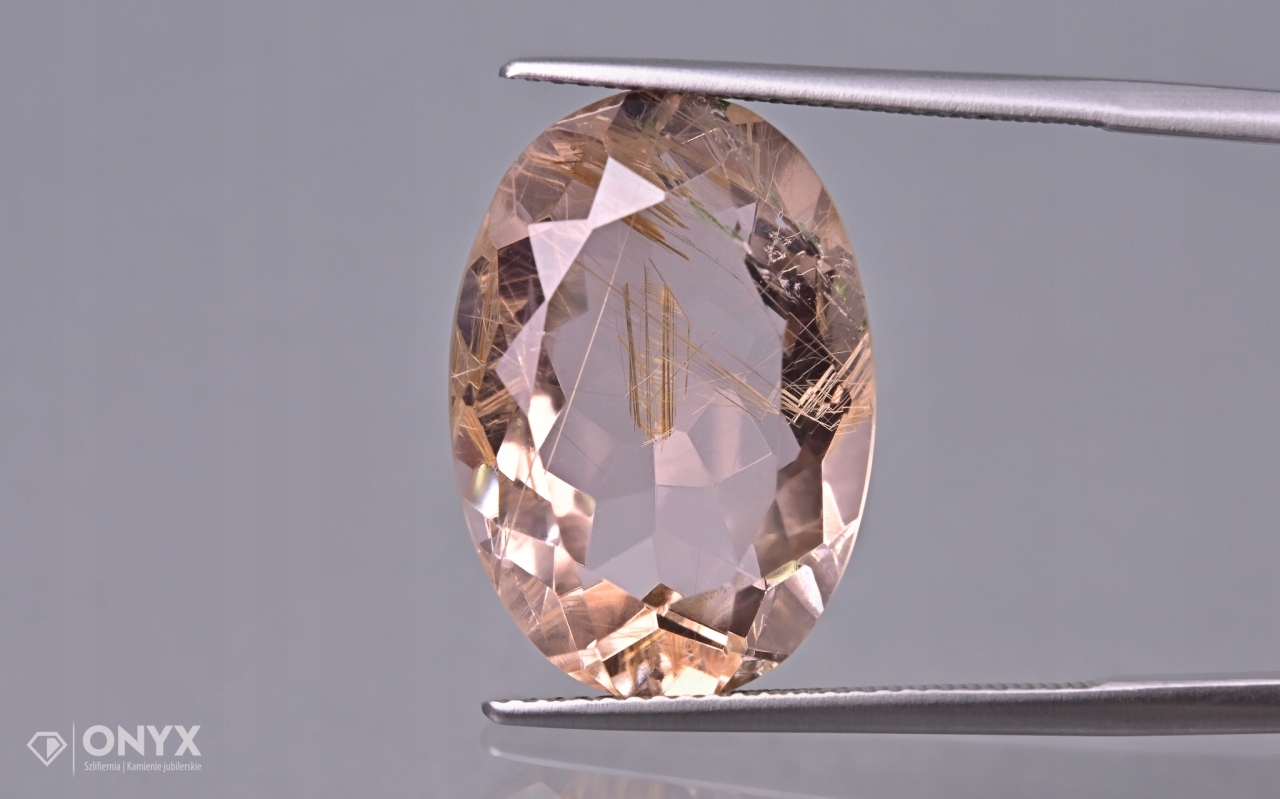 Křemen s rutilem fazetovaný ovál 20x14 mm