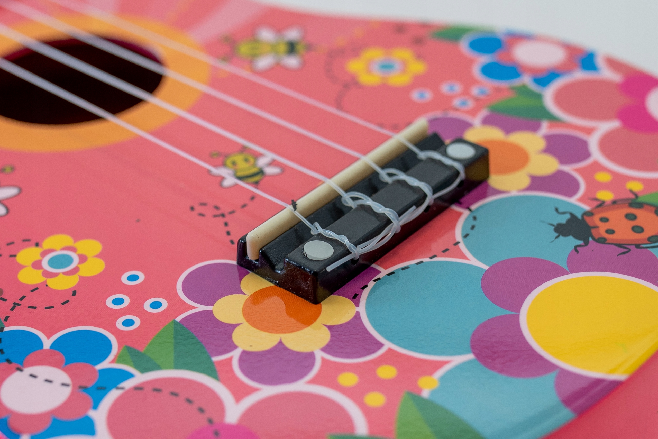 Ukulele sopranowe Różowa Łąka Pokrowiec Struny Kostki Stroik Akordy ZESTAW Marka Castelo