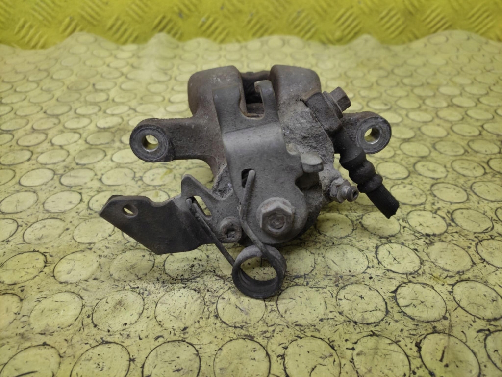 OPEL ASTRA H KOMBI 1.7 CDTI caliper brake left rear part