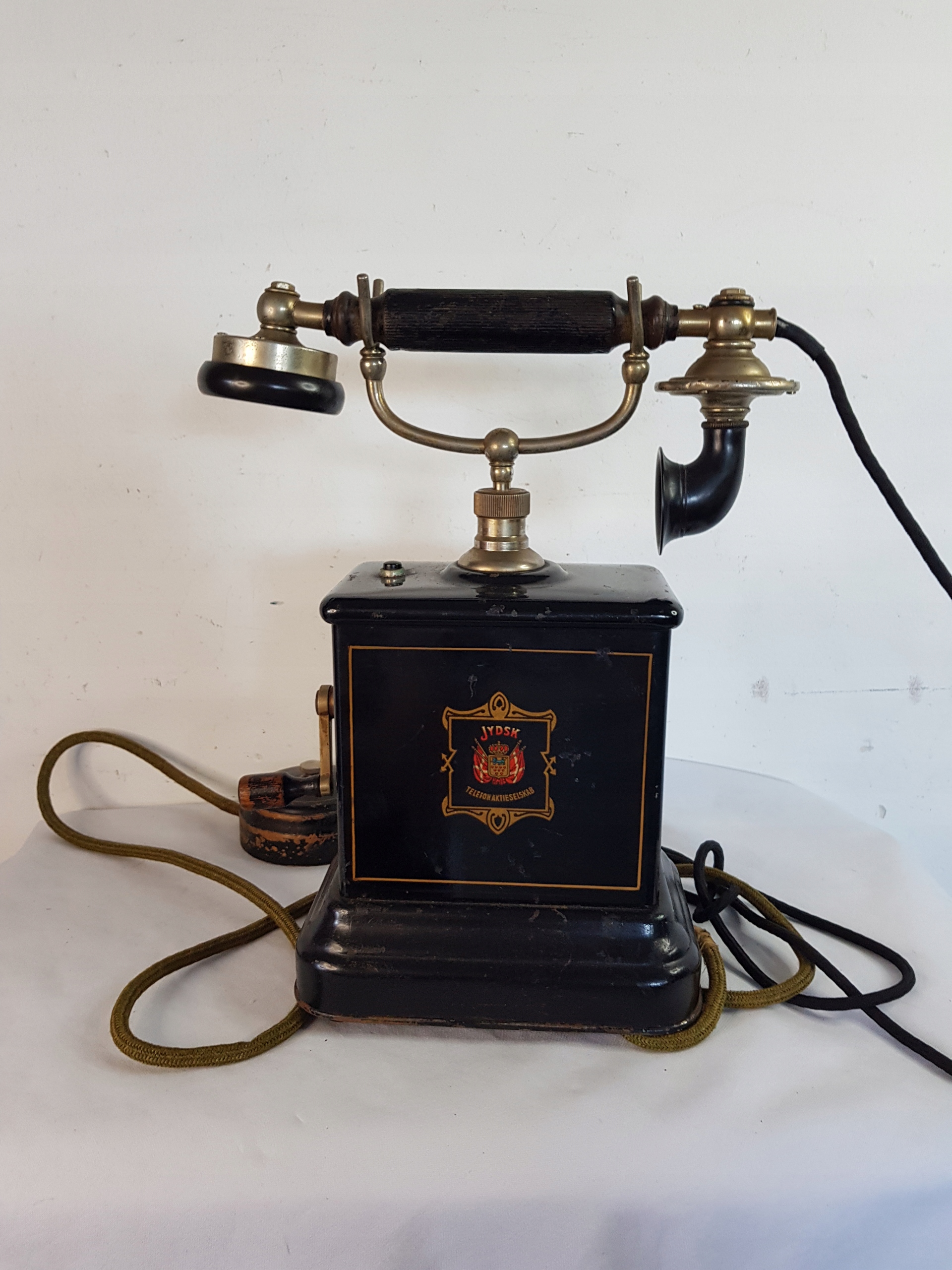 Телефон на ручку зажима Aktieselskab