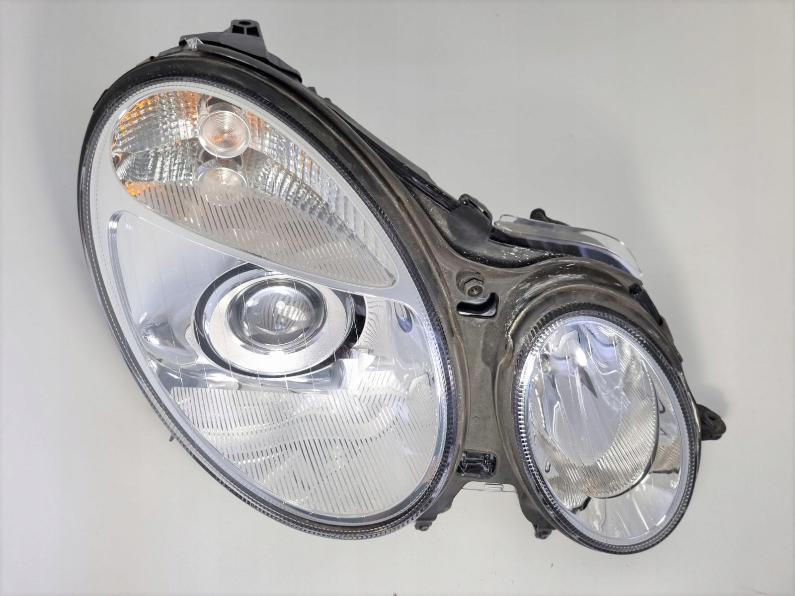REFLEKTOR LAMPA MERCEDES W211 BIXENON SKRĘTNY za 1090 zł z Leszno Allegro.pl (12171410736)