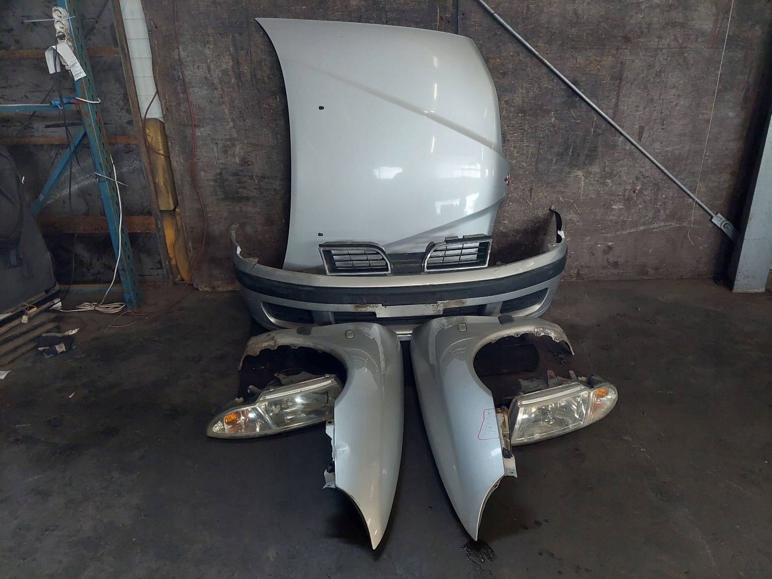 complete front MITSUBISHI CARISMA and FL A50 bonnet bumper lights