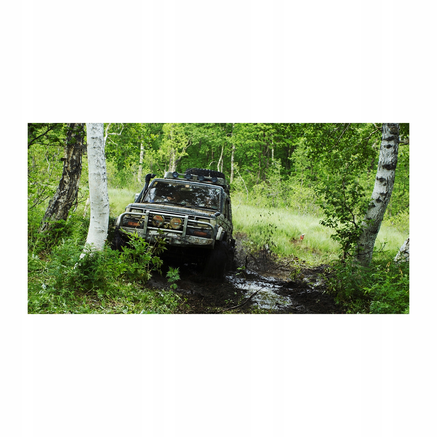 

Foto obraz akryl zdjęcie Jeep w lesie 120X60 cm