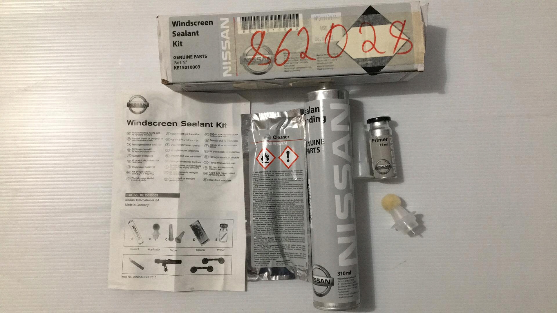 NISSAN МОНТАЖНЫЙ КОМПЛЕКТ / КЛЕЙ KE15010003