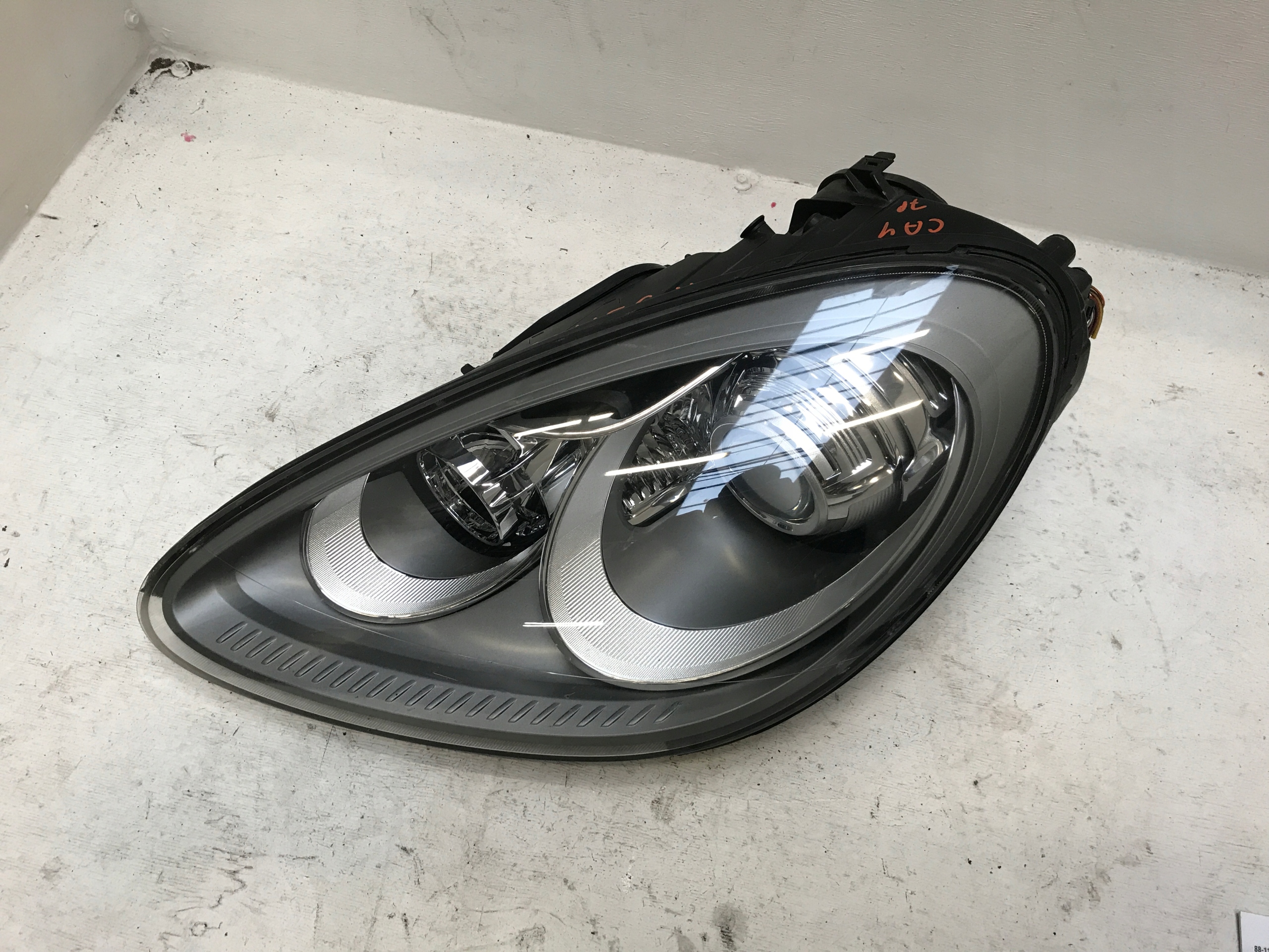 CAYENNE 7P LAMPA PRZÓD LEWA XENON EU KPL 10-14