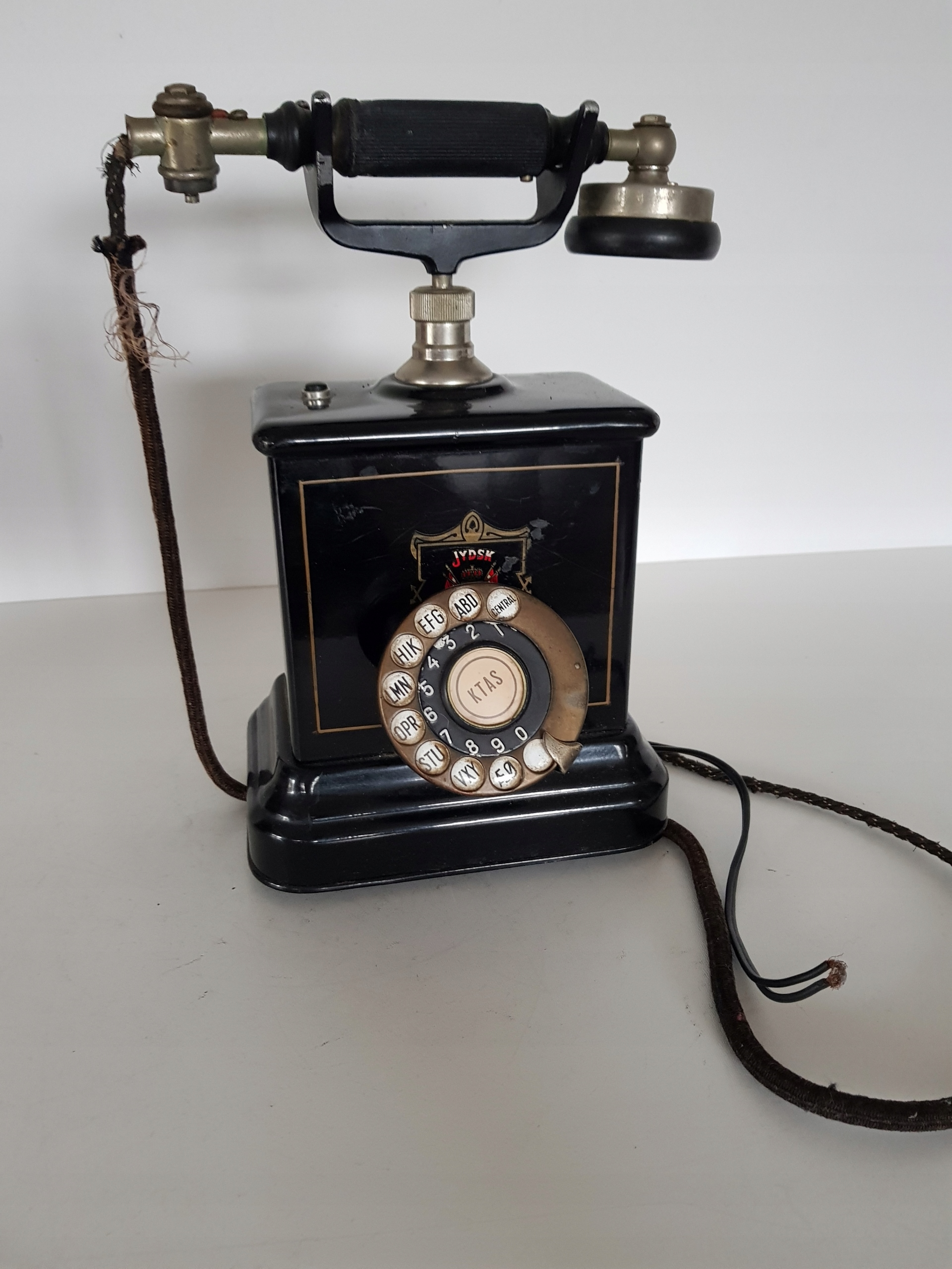 Телефон на ручку зажима Aktieselskab