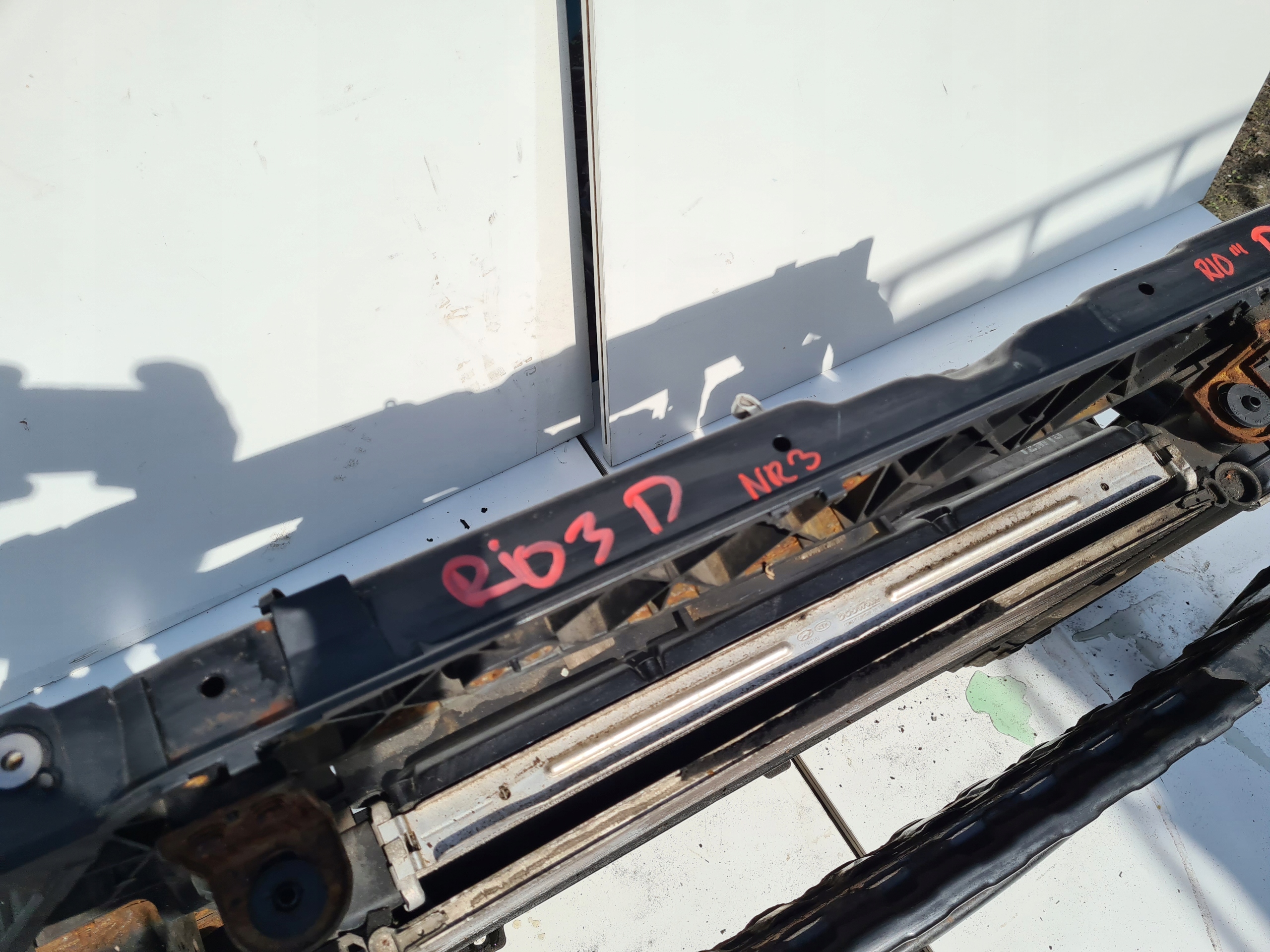 KIA RIO III tension belt radiator sider front 1,1CRDI