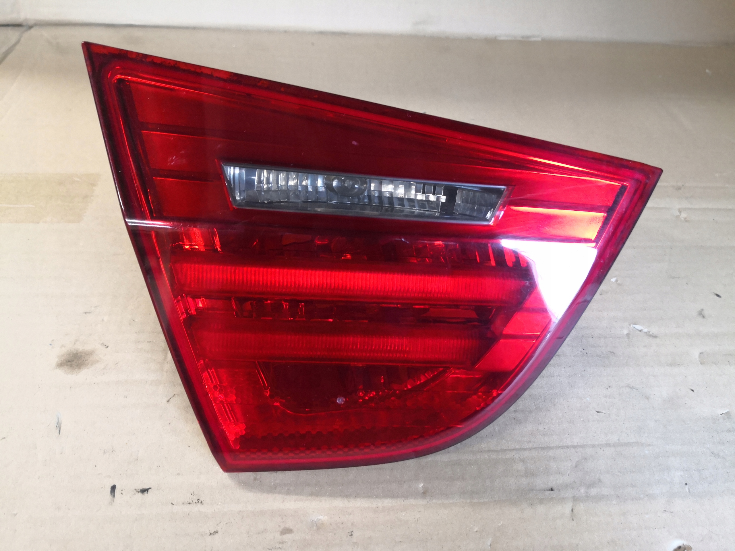 light bonnet left rear part BMW E90 LIFT 7289427