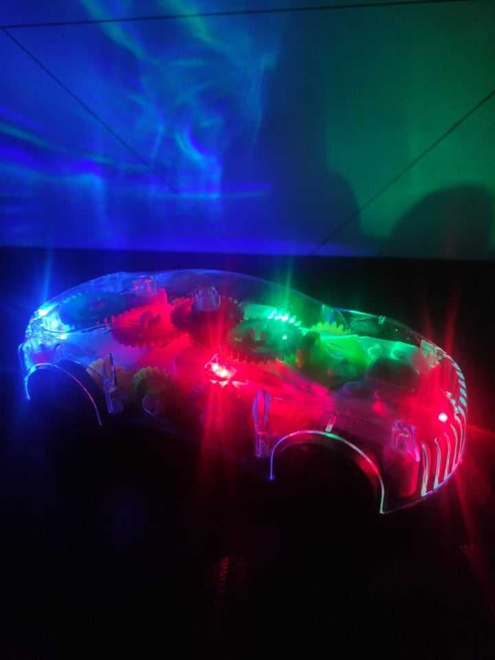 Magiczny Samochód, Samojezdne auto na baterie, świecące, grające, z trybami Efekty dźwiękowe ruchowe świetlne