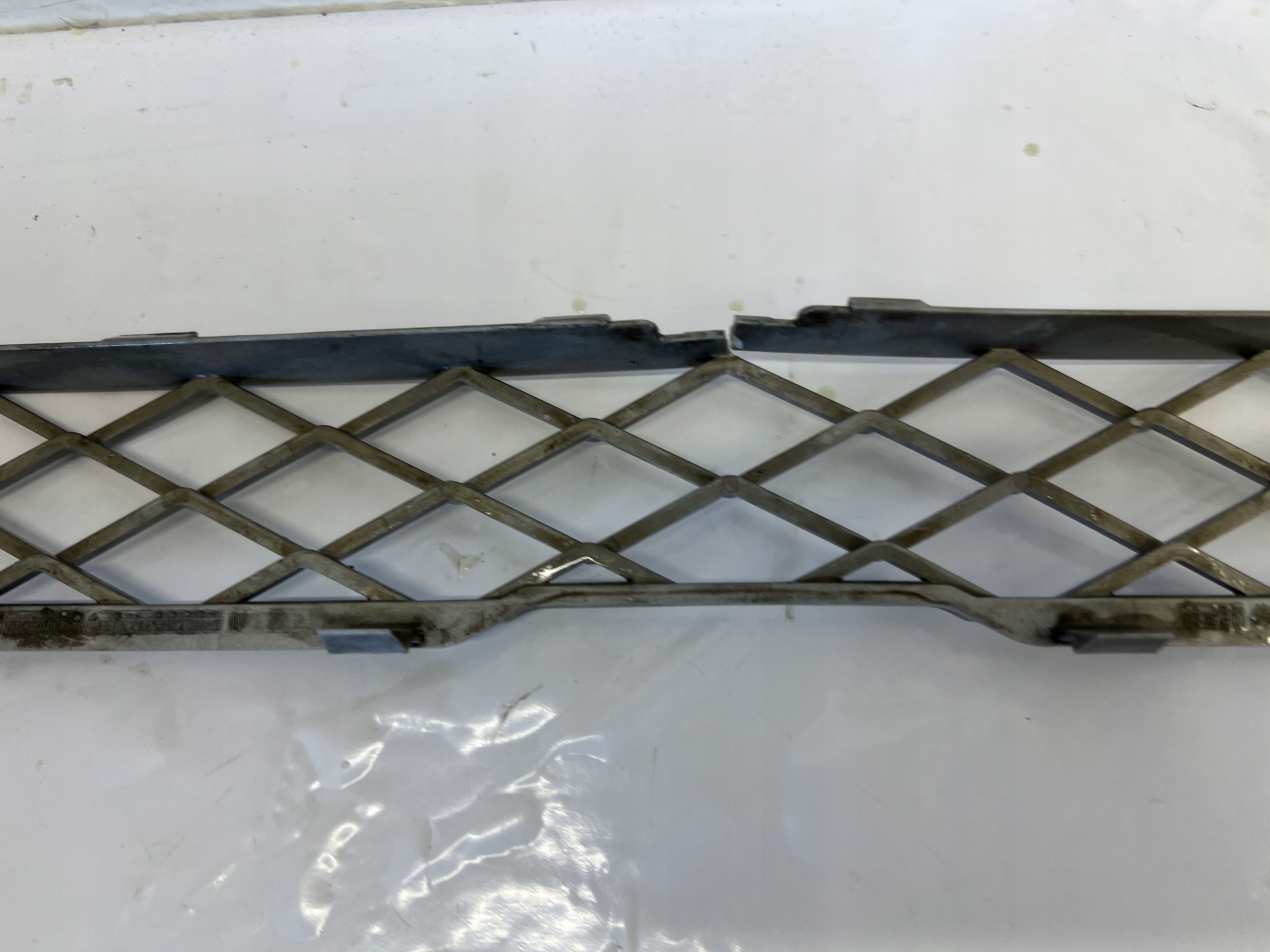 BMW X5 E70 LCI moulding grid central of a bumper front 7159597