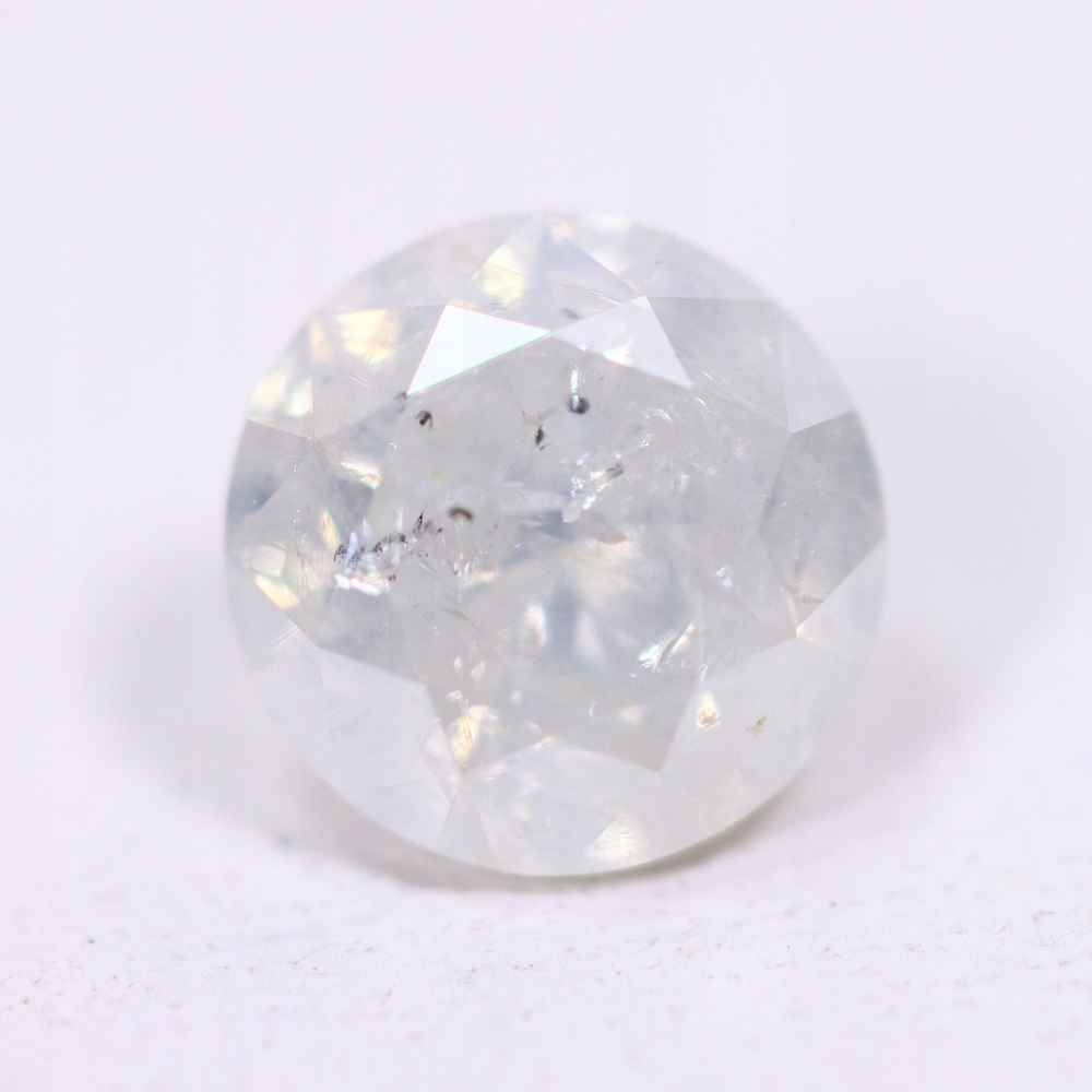 Přírodní diamant 0.73 ct K Brilant I3 certifikát Wbd
