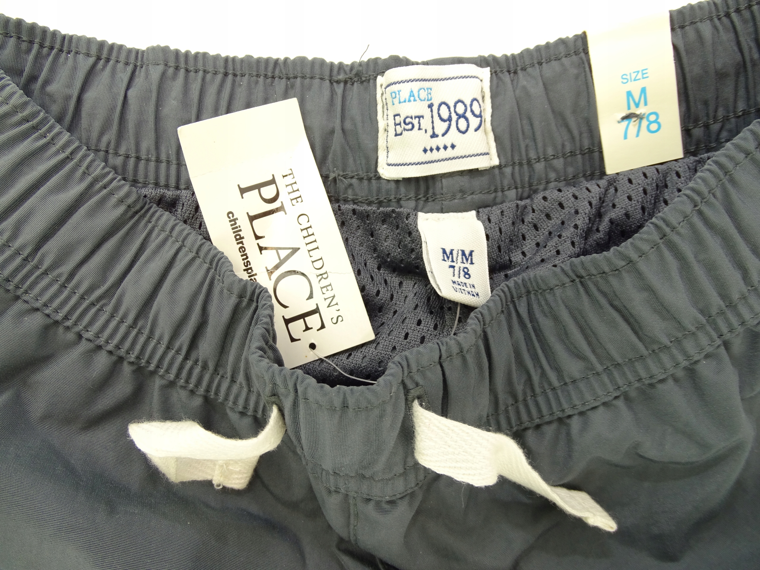 Spodnie przeciwdeszczowe Place 7 L122/128 USA Nowe Marka Inna marka