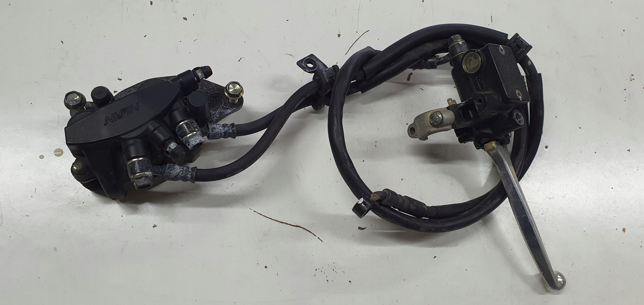 HONDA VISION 110 ПРАВИЙ ГАЛЬМІВНИЙ НАСОС + СУПОРТ