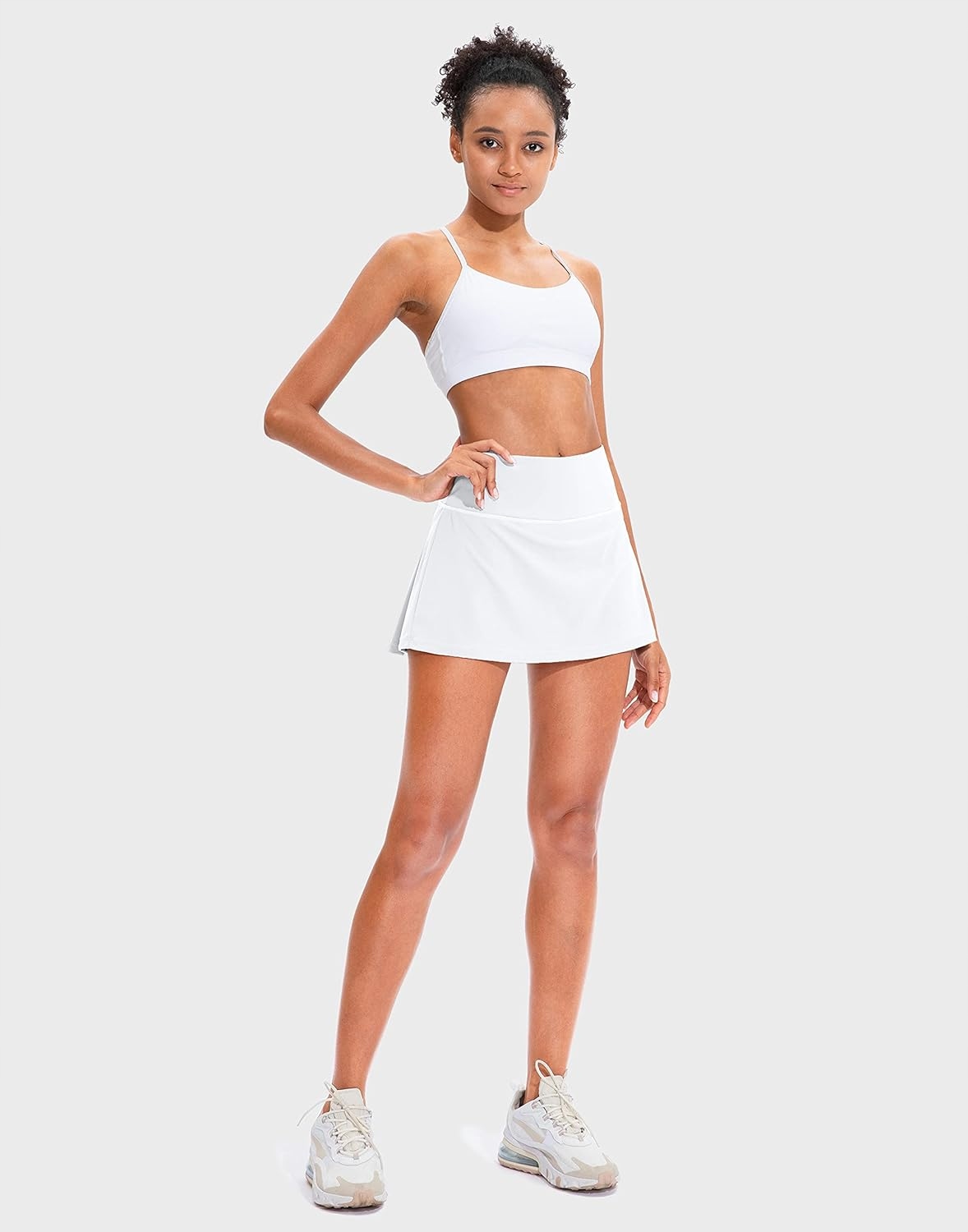 PLISOWANA SPÓDNICA TENISOWA DLA KOBIET Z KIESZENIAMI I WYSOKIM STANEM Materiał dominujący poliester