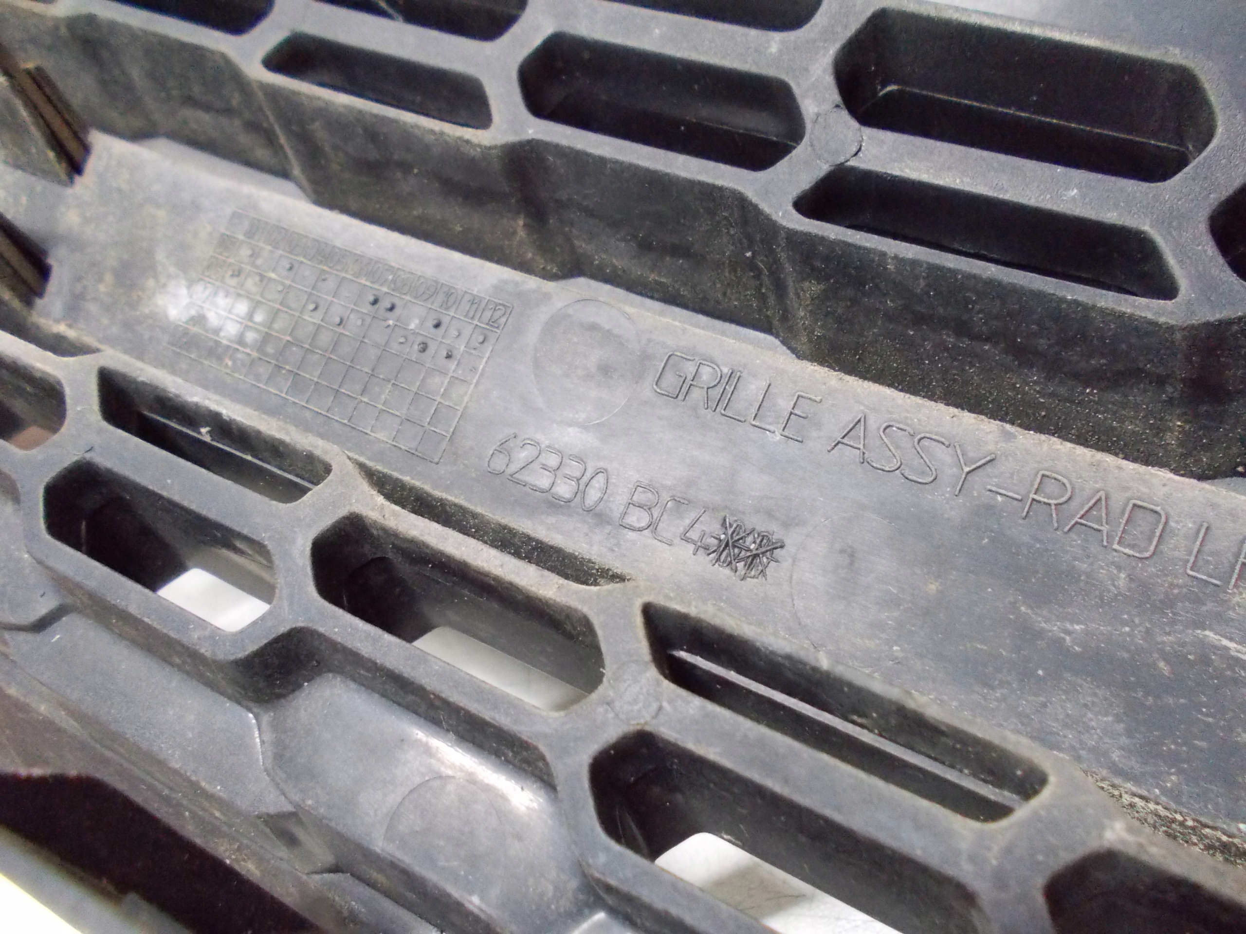 NISSAN MICRA K12 O7R grid of a bumper indicator left 62330