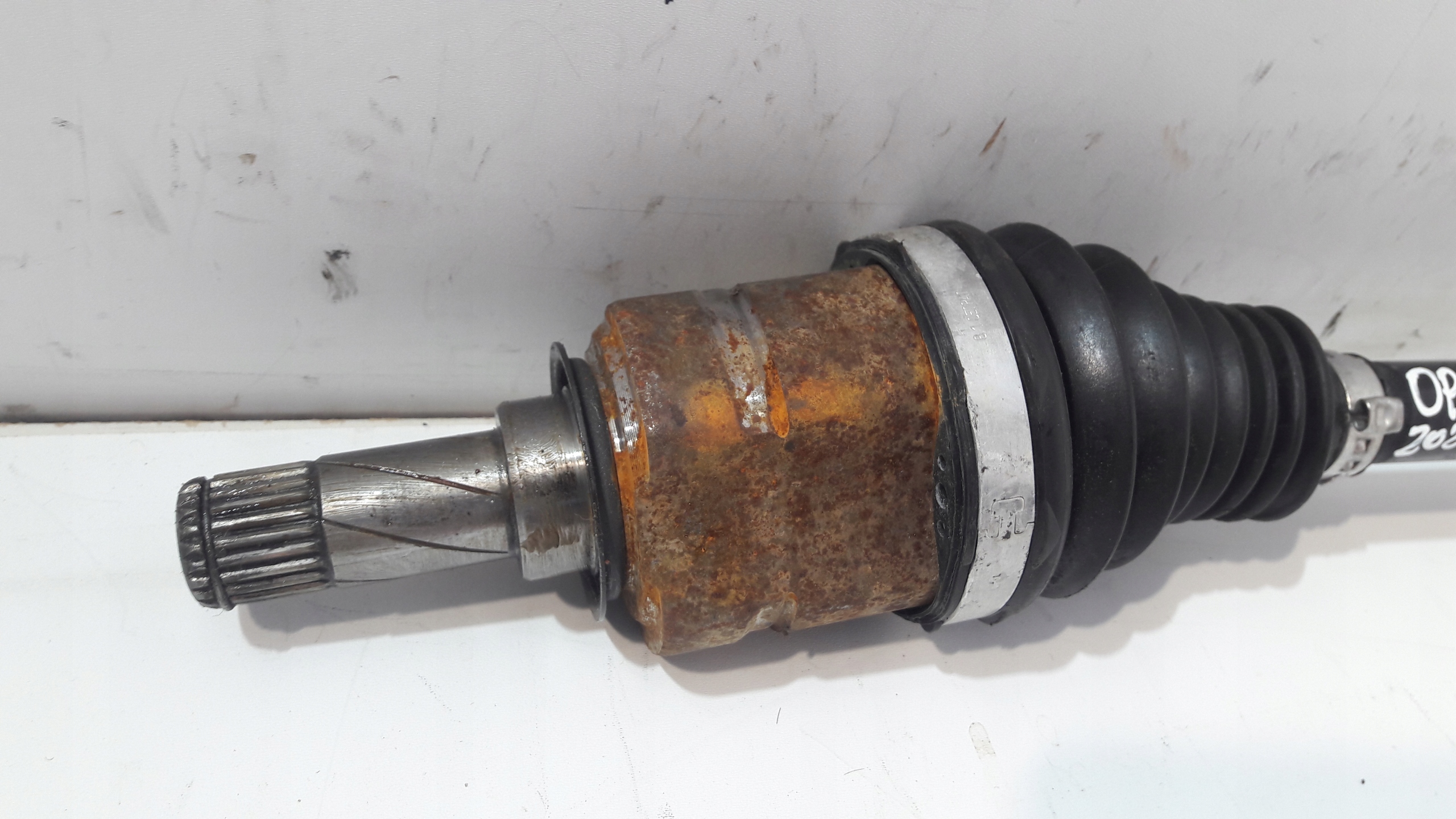 OPEL CORSA E semi-axis left front 13486866