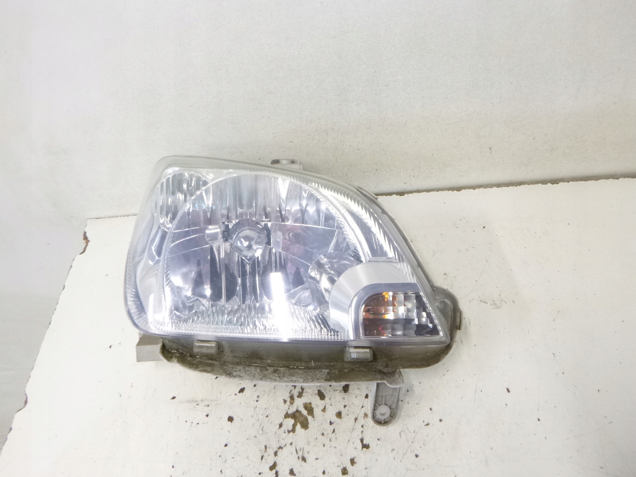 light front right Daihatsu Cuore VI 2004r. 100-51731